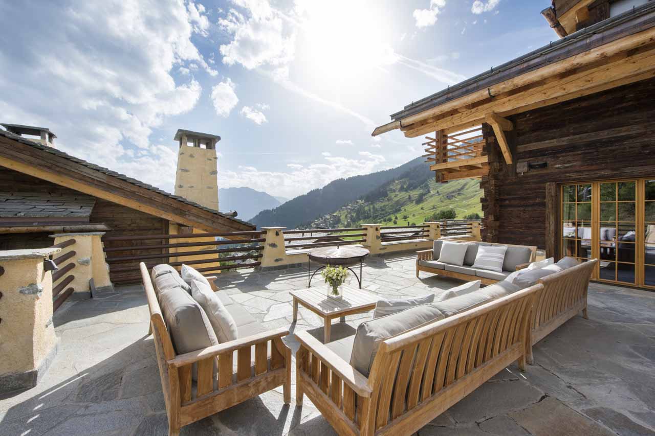 Seating area on terrace at  Chalet Chouqui in Verbier