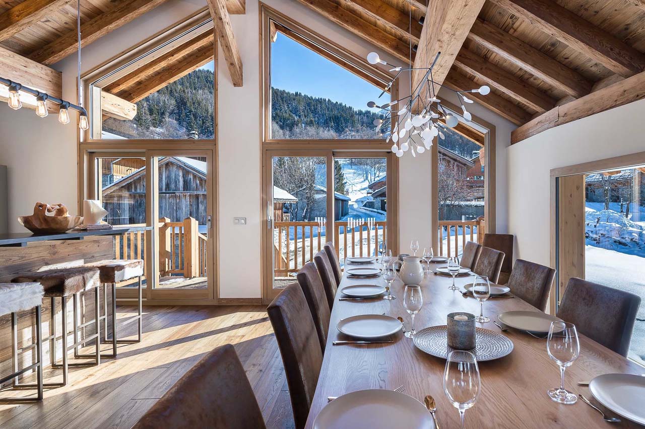 Dining table and breakfast bar at Chalet Fontany in Meribel