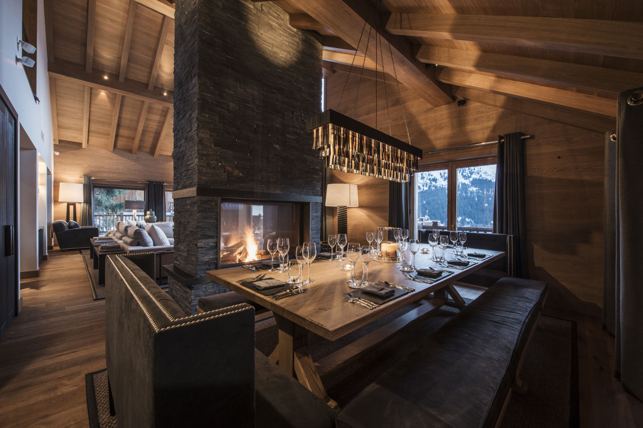 Dining area with balcony access in Chalet Le Grenier in Meribel