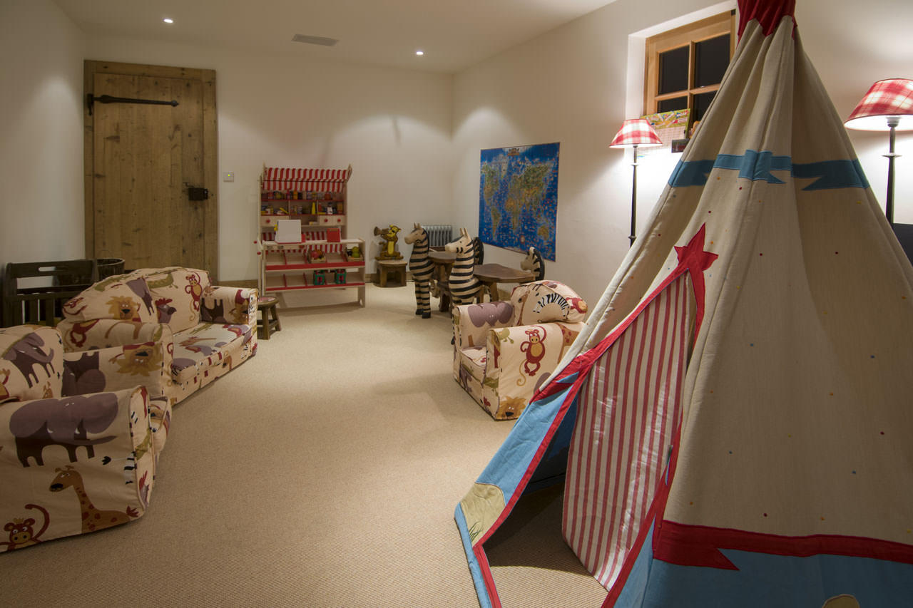 Playroom with toys at Chalet Nyumba in Verbier