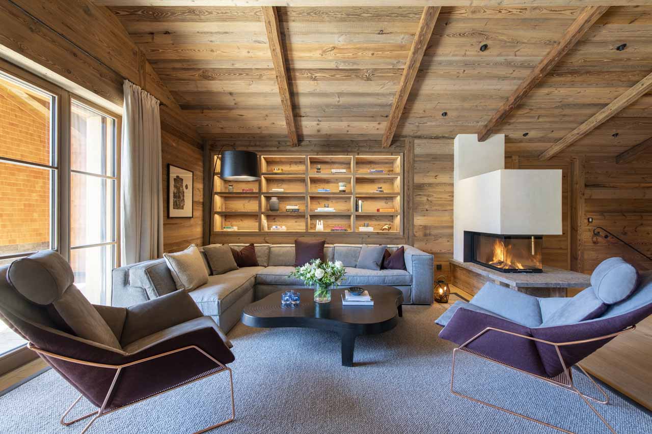Living area with fireplace at Chalech L in Lech