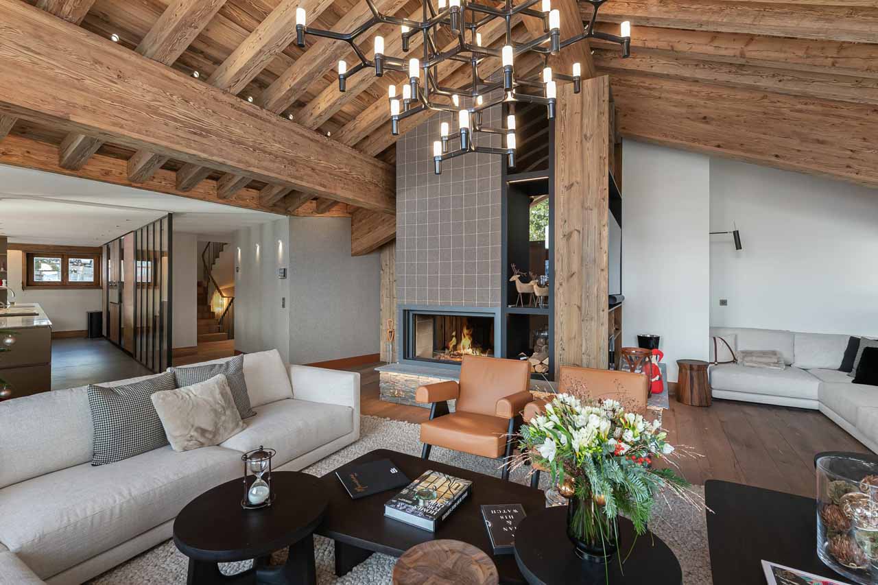 Fireplace in living area at Chalet Les Bruxellois in Courchevel 1850