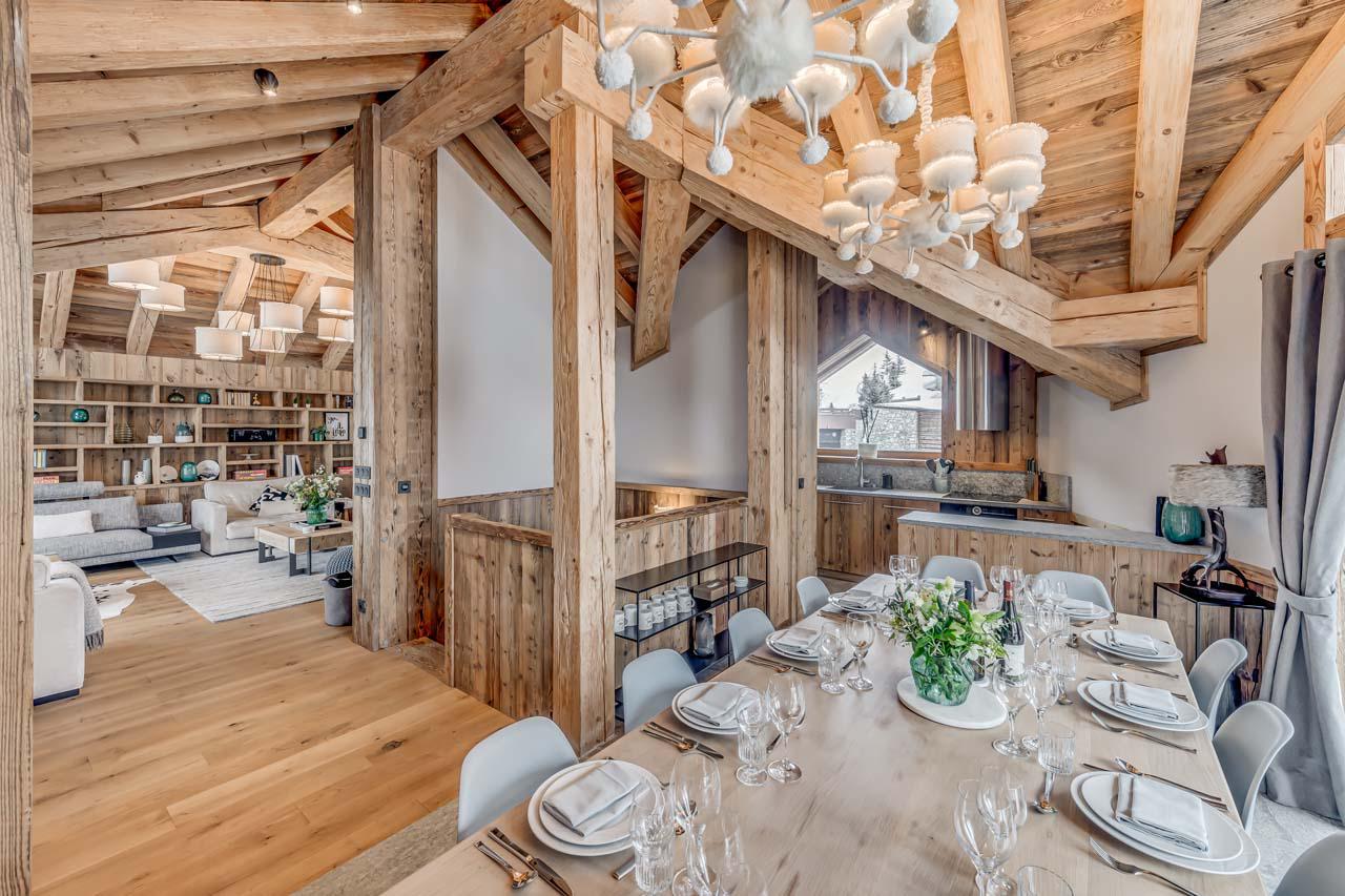Elegant wooden dining table at Chalet Juno in Val d'Isere