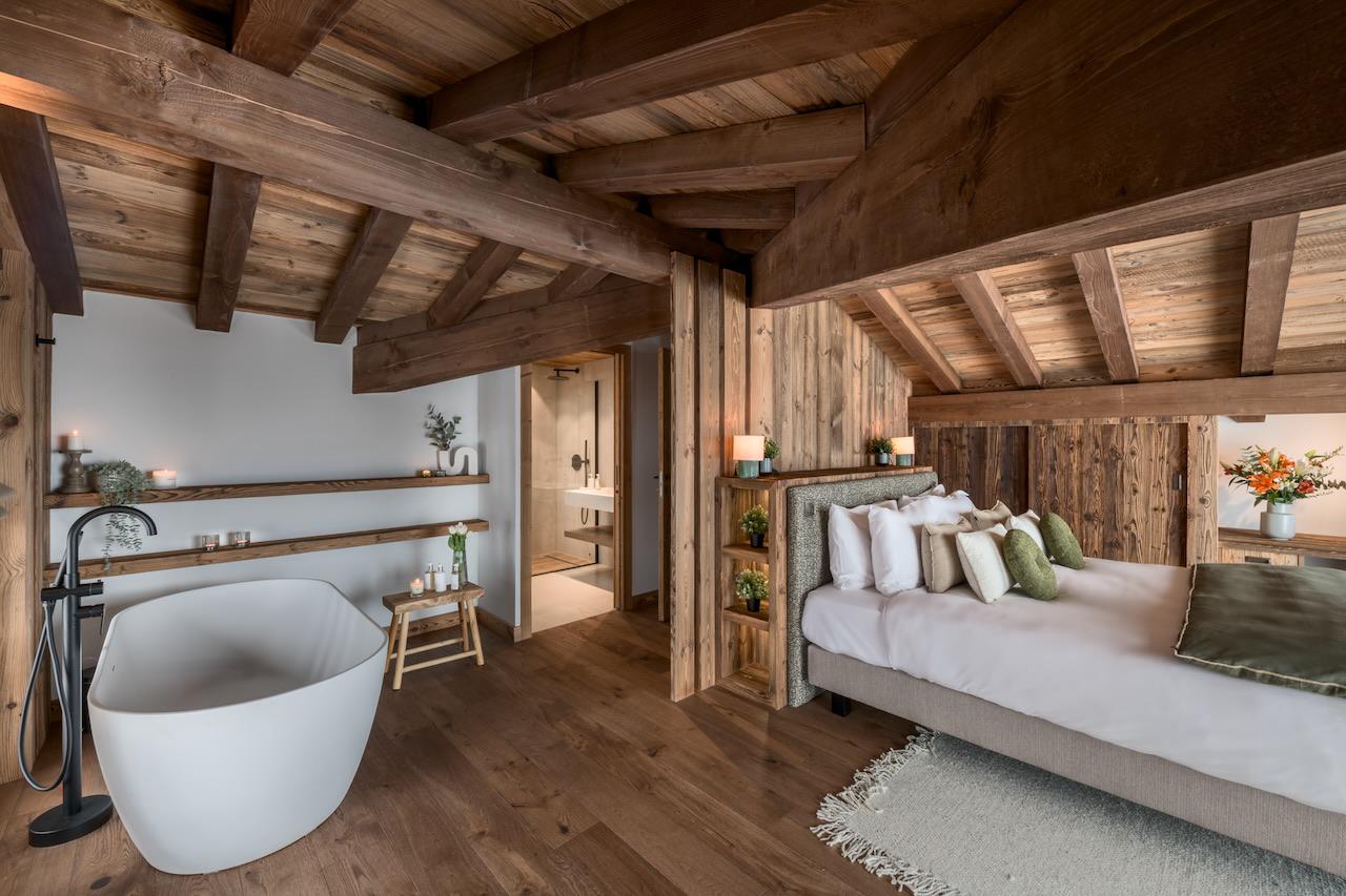 Freestanding bathtub within master suite at Chalet Tosca in Les Gets