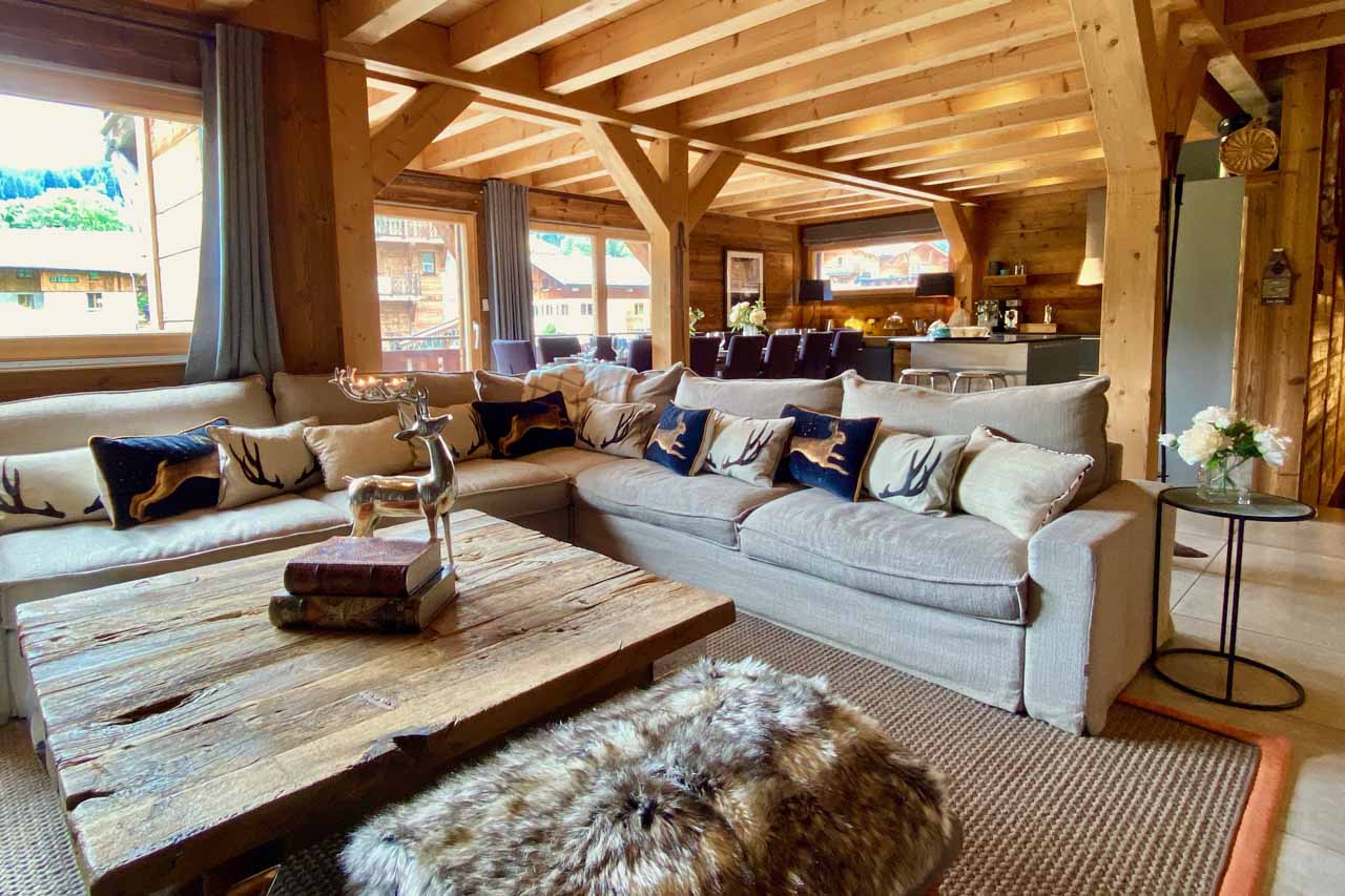Lounge and dining area in summer at Chalet Valambrun in Les Gets