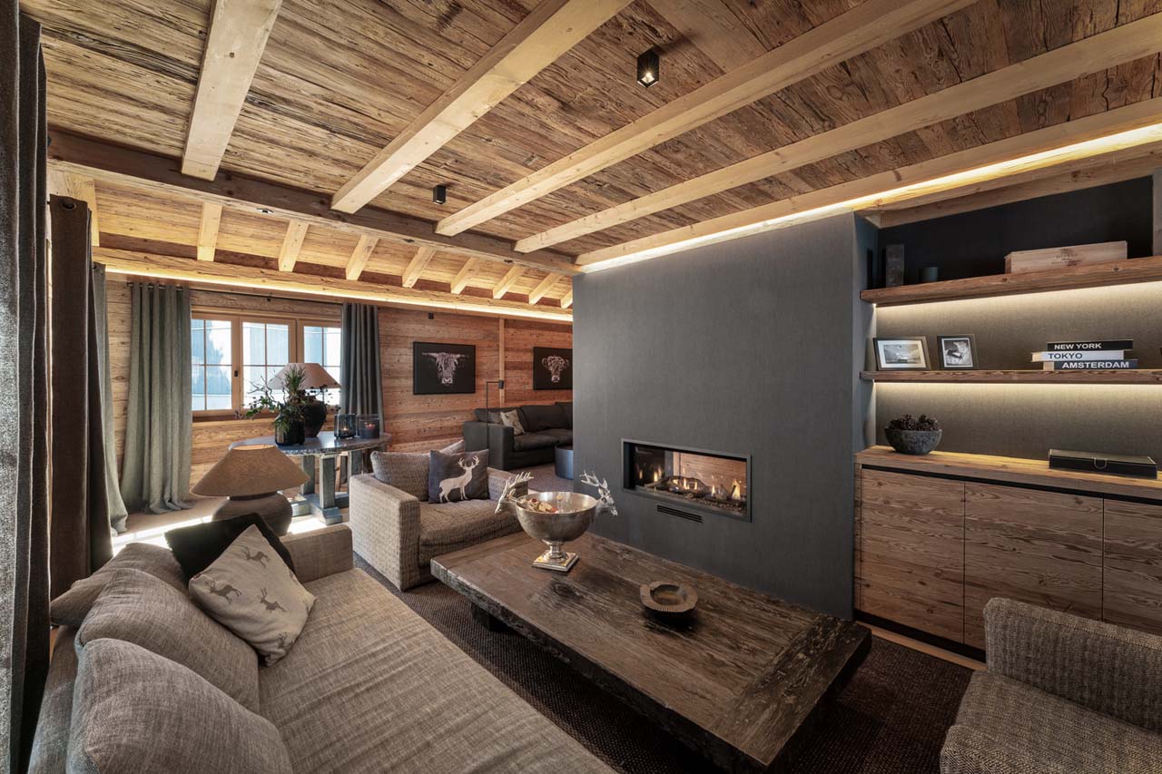 Sofas and fireplace in Chalet Wood, Davos