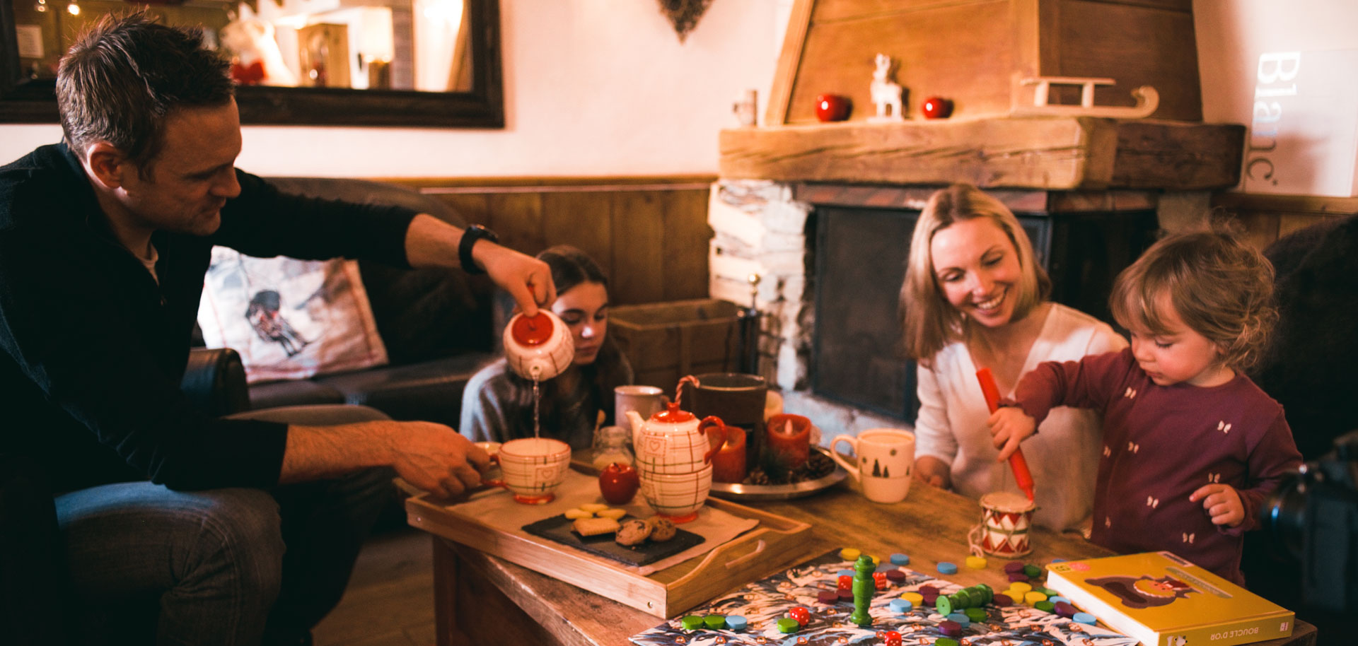 Family playing together in chalet