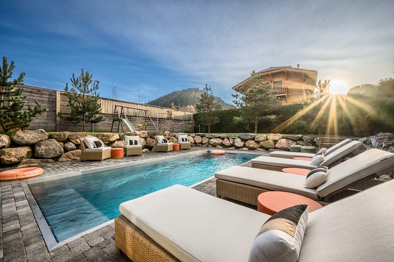 Outdoor pool at The Bungo in Morzine in summer