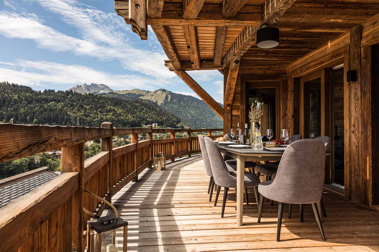 Al fresco dining on terrace at ZEMS Lodge in Morzine