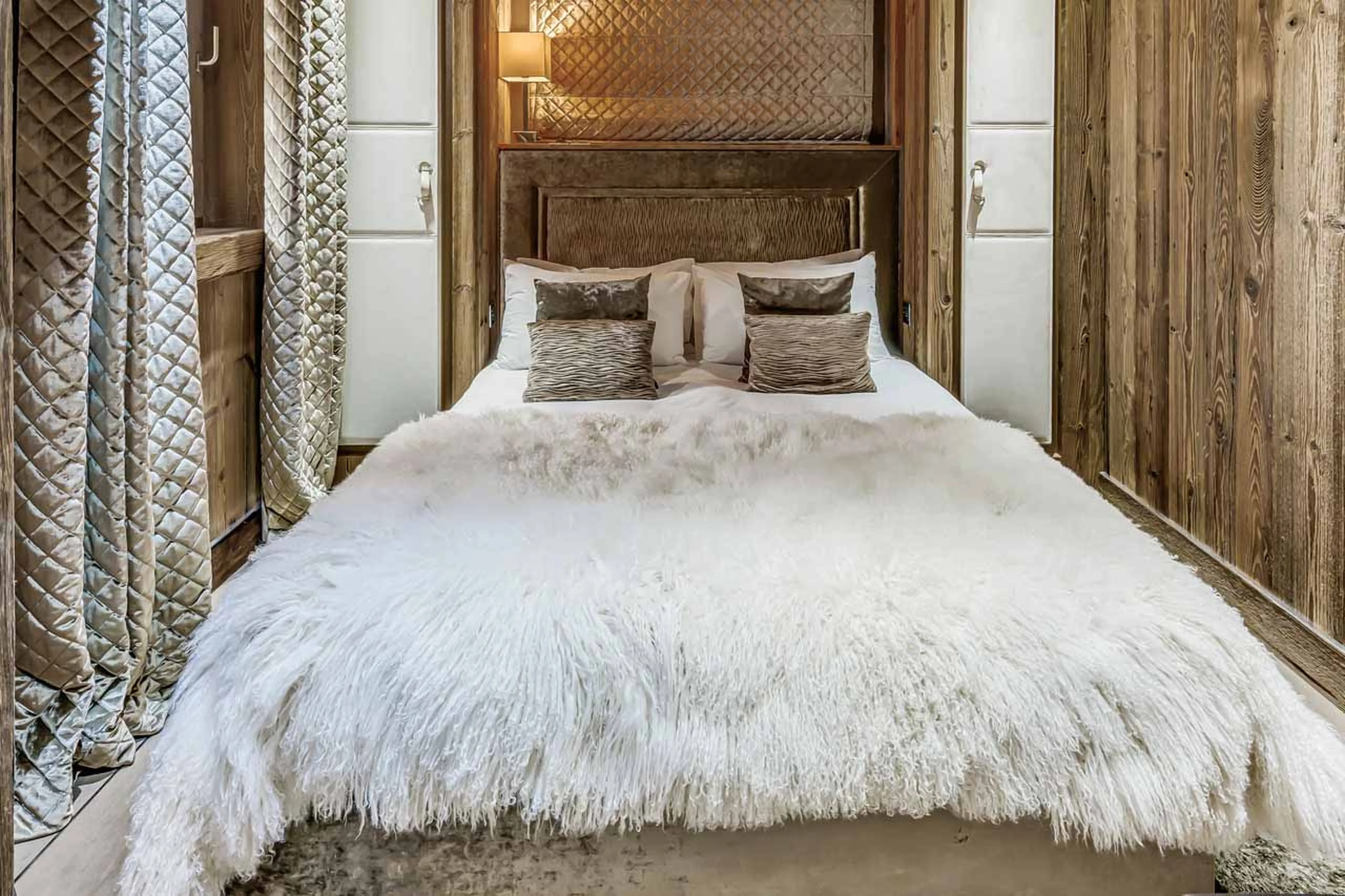 Double bed bedroom with en suite shower room in Chalet Carat, Courchevel 1850