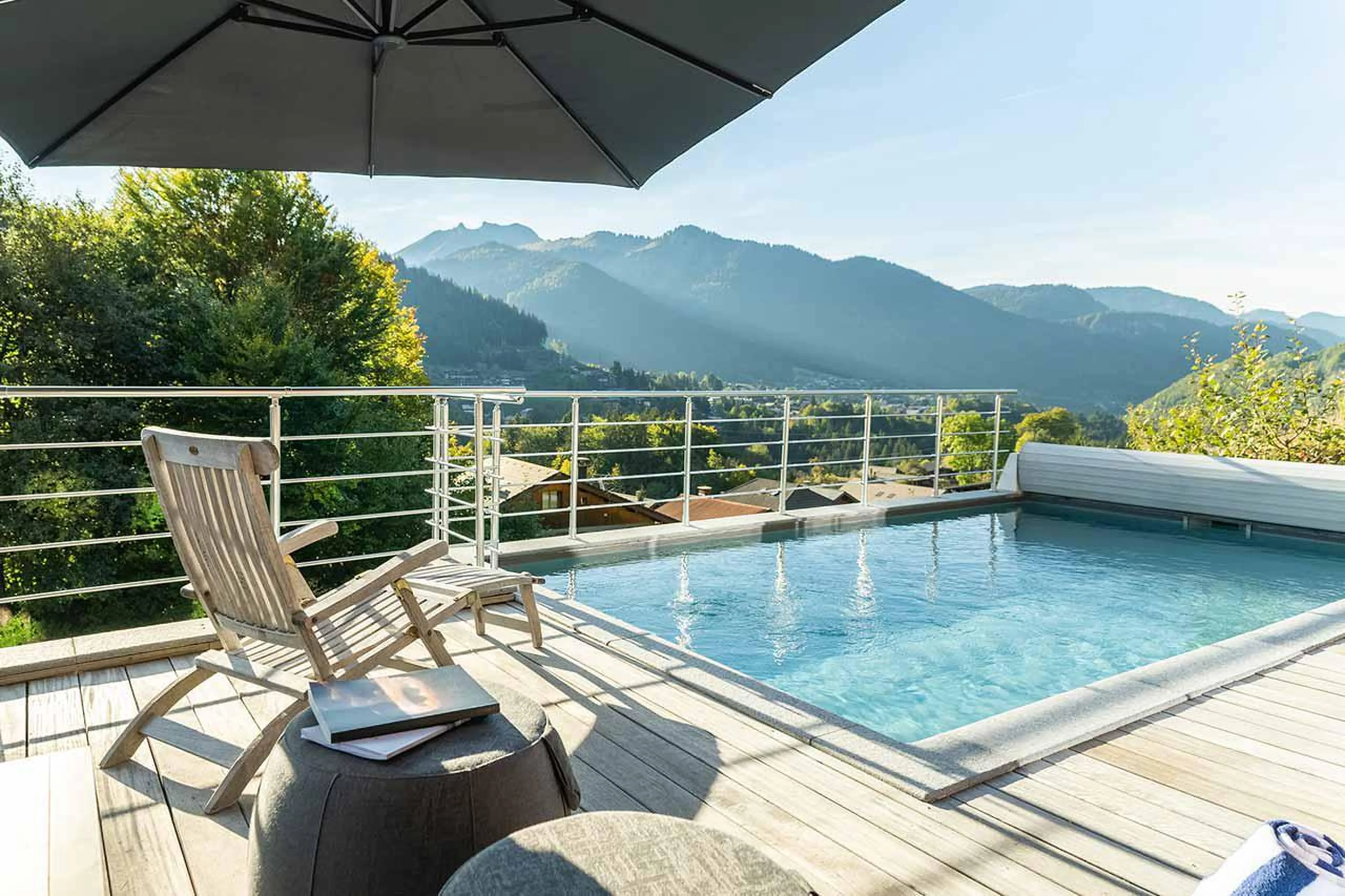 Outdoor pool at Alpine Retreat in Morzine in summer