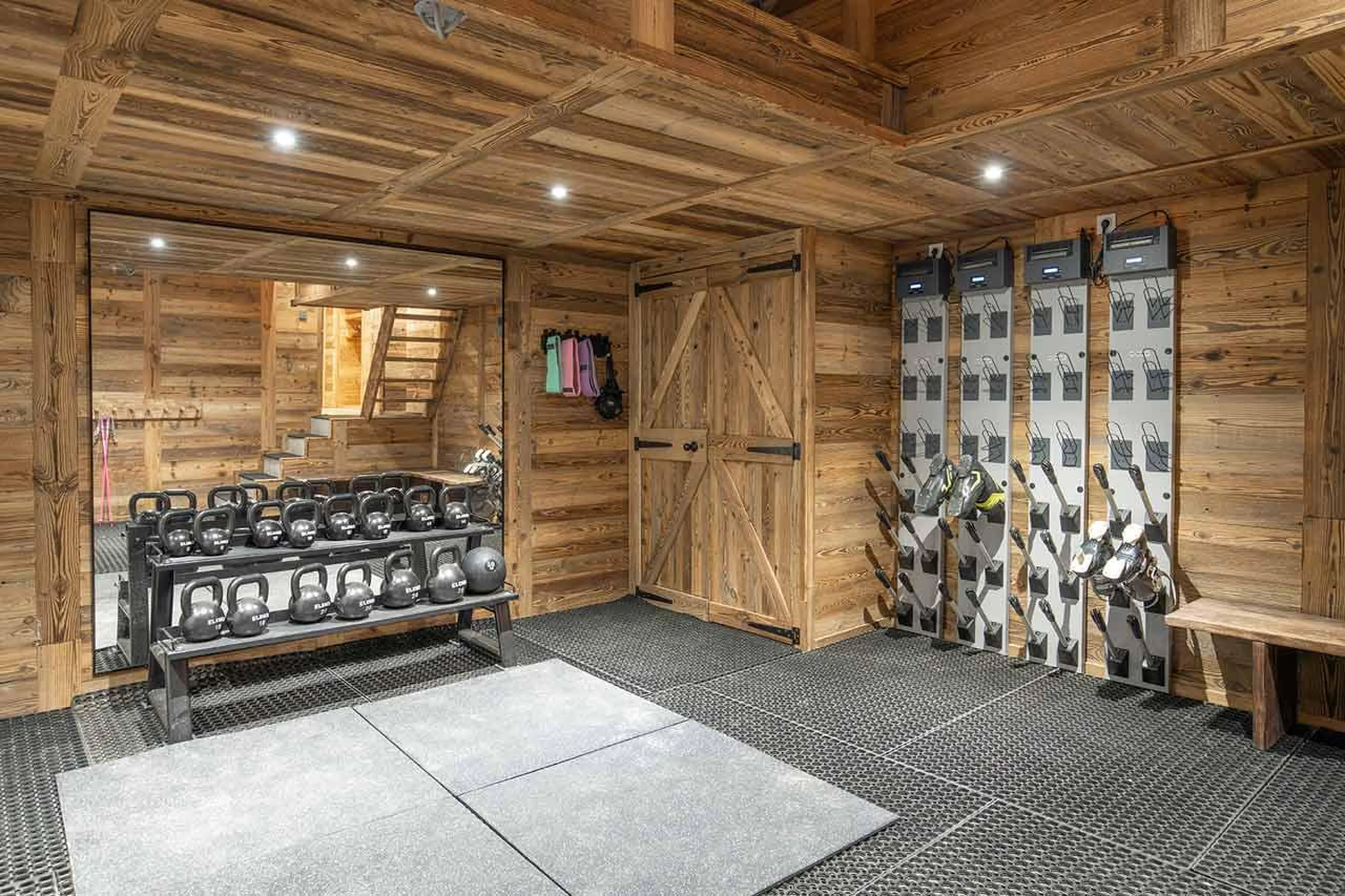 Fitness area with weights in Alpine Retreat in Morzine