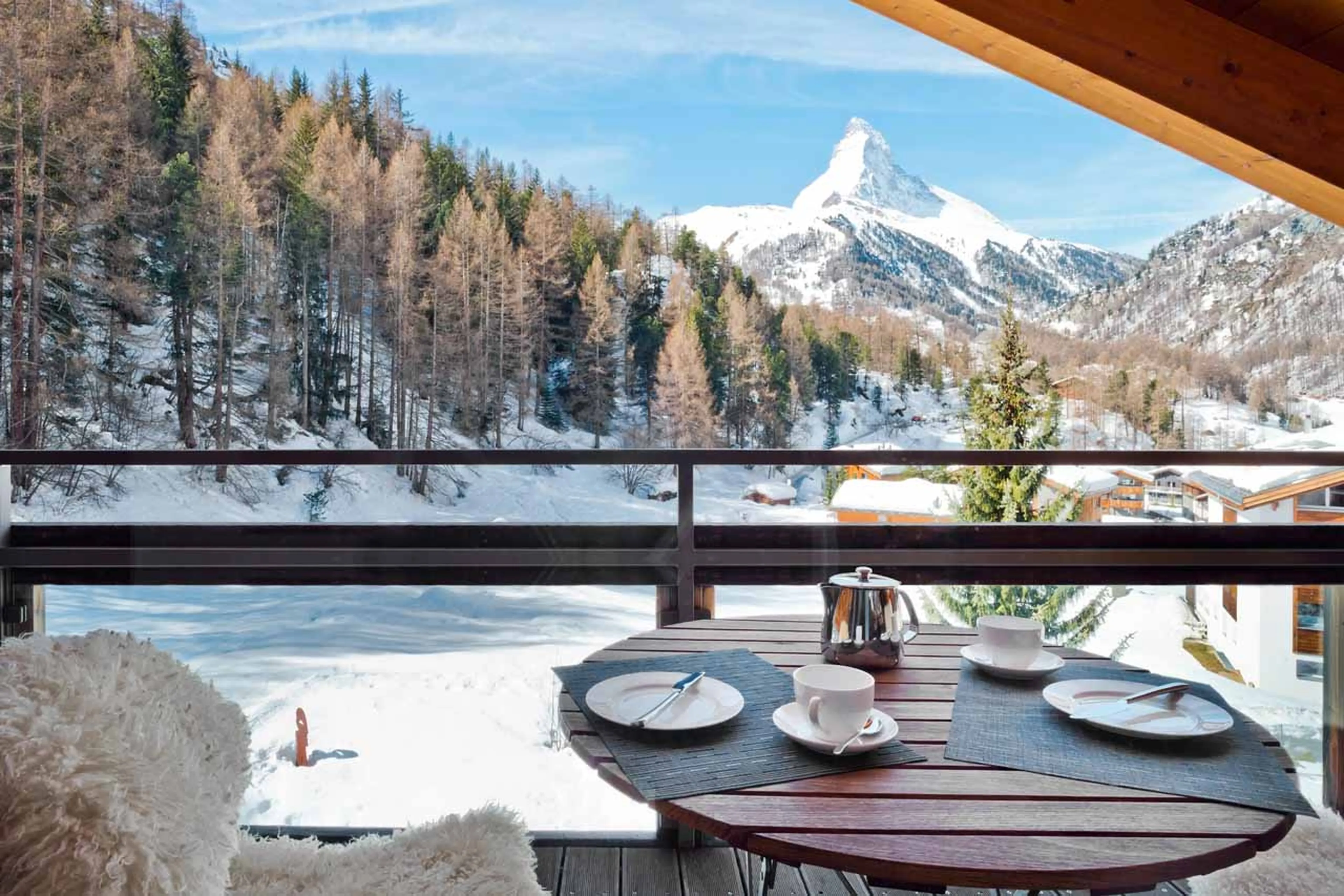 Coffee on the balcony with view of Matterhorn at Penthouse Altesse in Zermatt