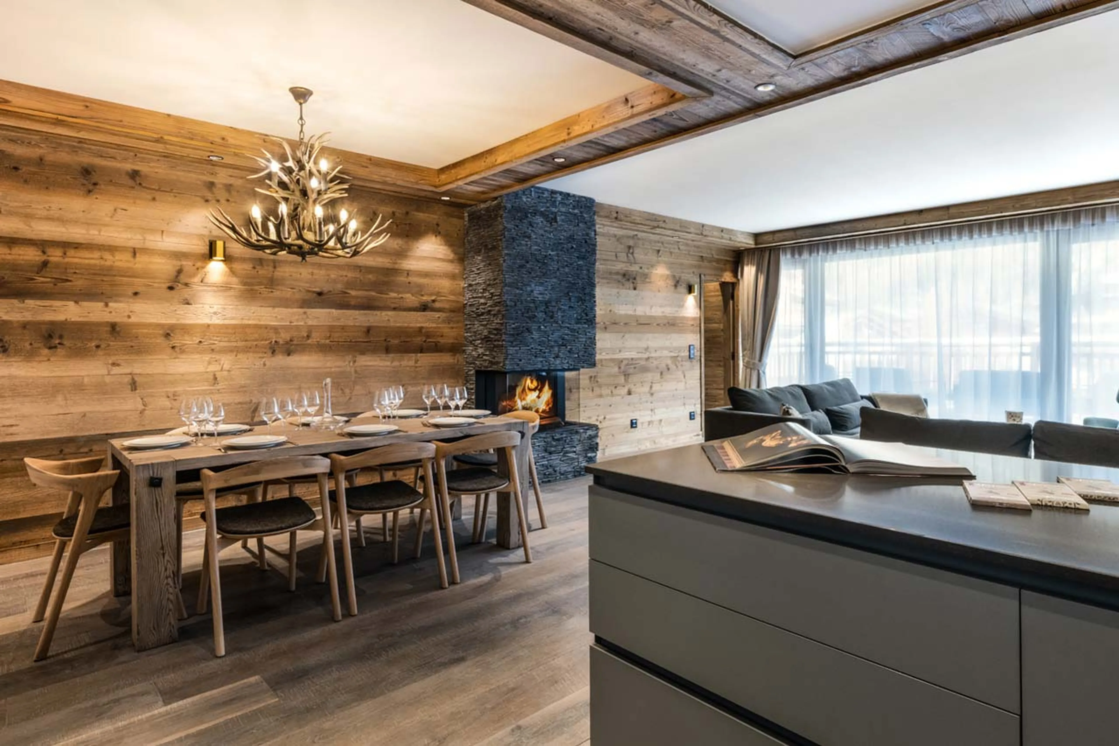 Dining area and open-plan kitchen of Alaska Lodge 1 in Val d'Isere