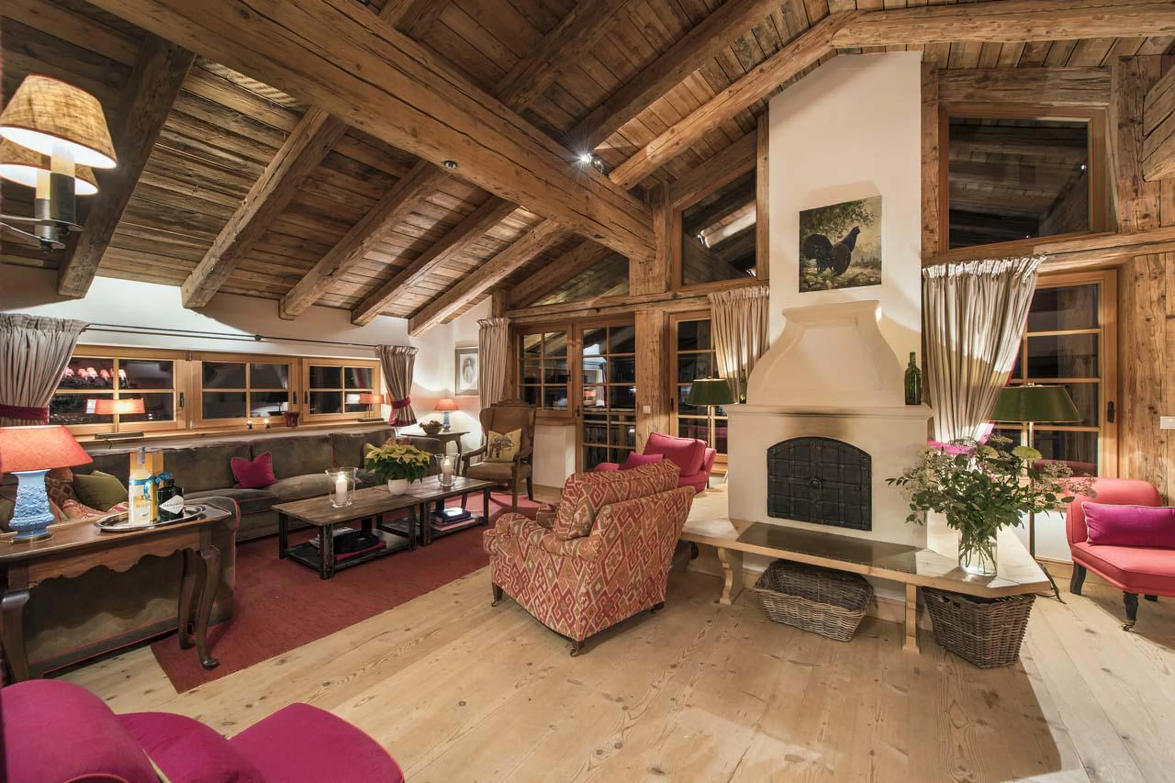 Austrian fireplace central within the open-plan living area at Apartment Antoinette in St Anton