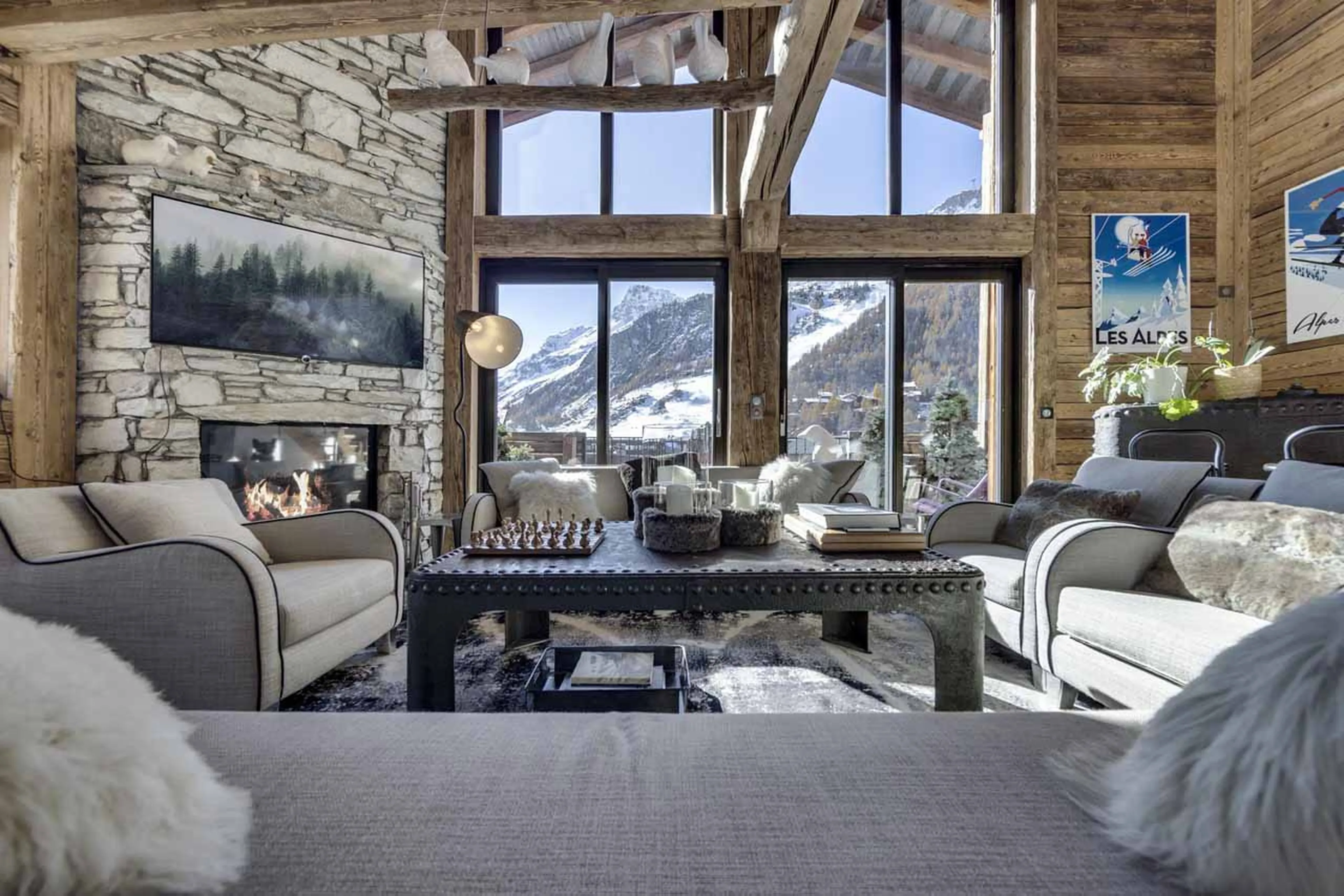 Double height windows in living room at Chalet Artemis in Val d'Isere
