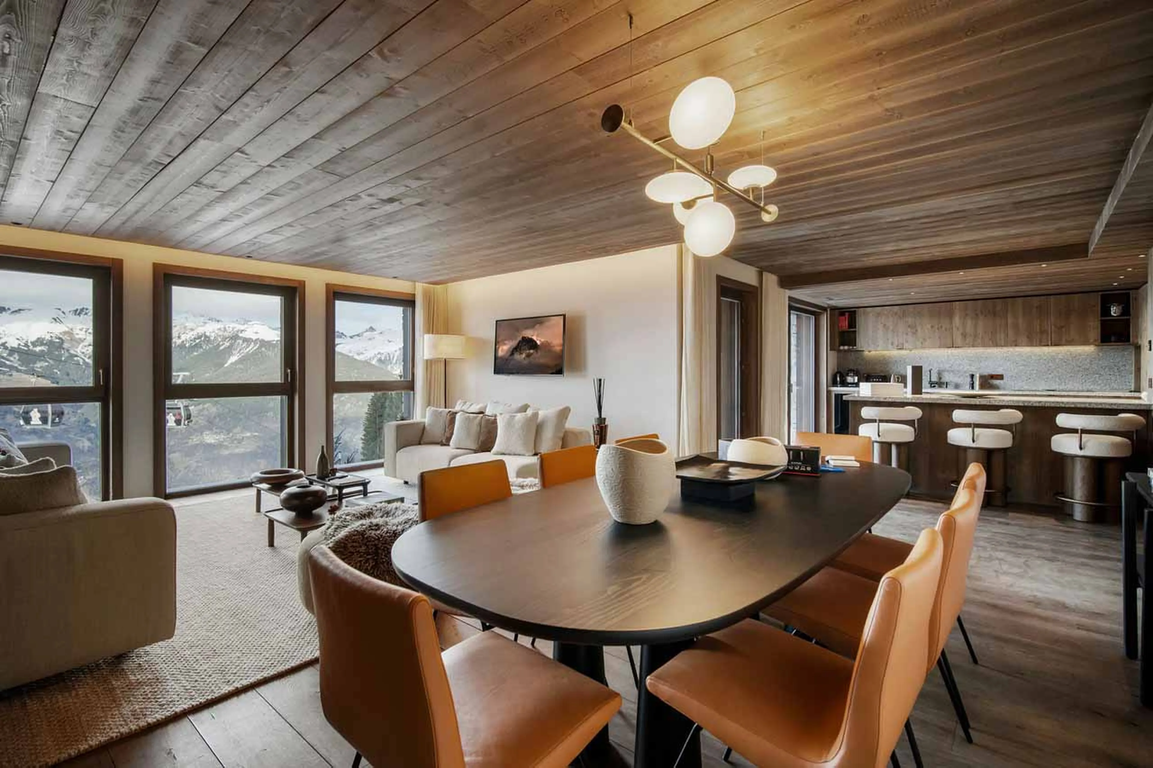 Dining area with table and chairs in Atmosphere Apartment 102, Courchevel 1850