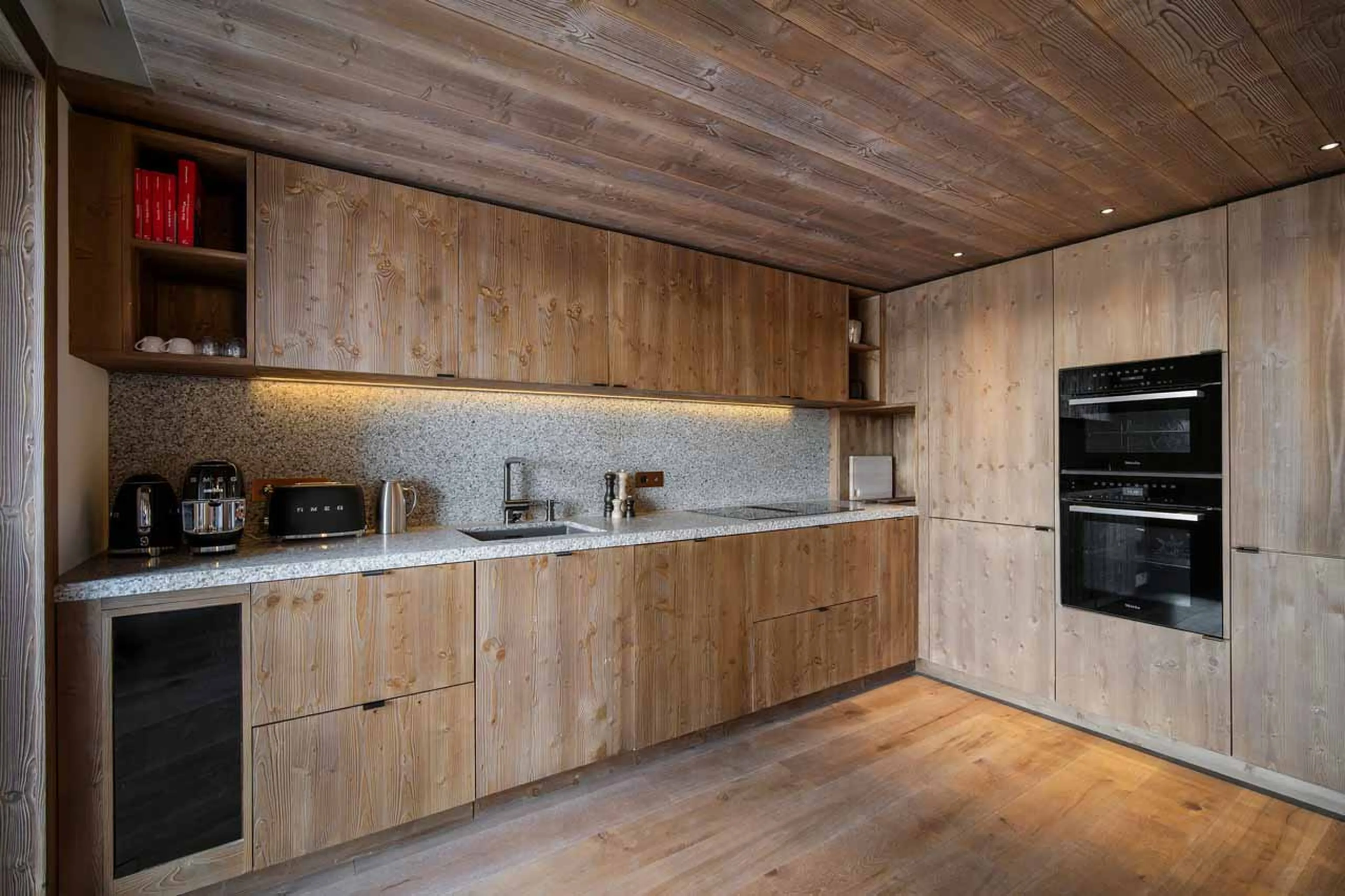 Kitchen with central island in Atmosphere Apartment 102, Courchevel 1850