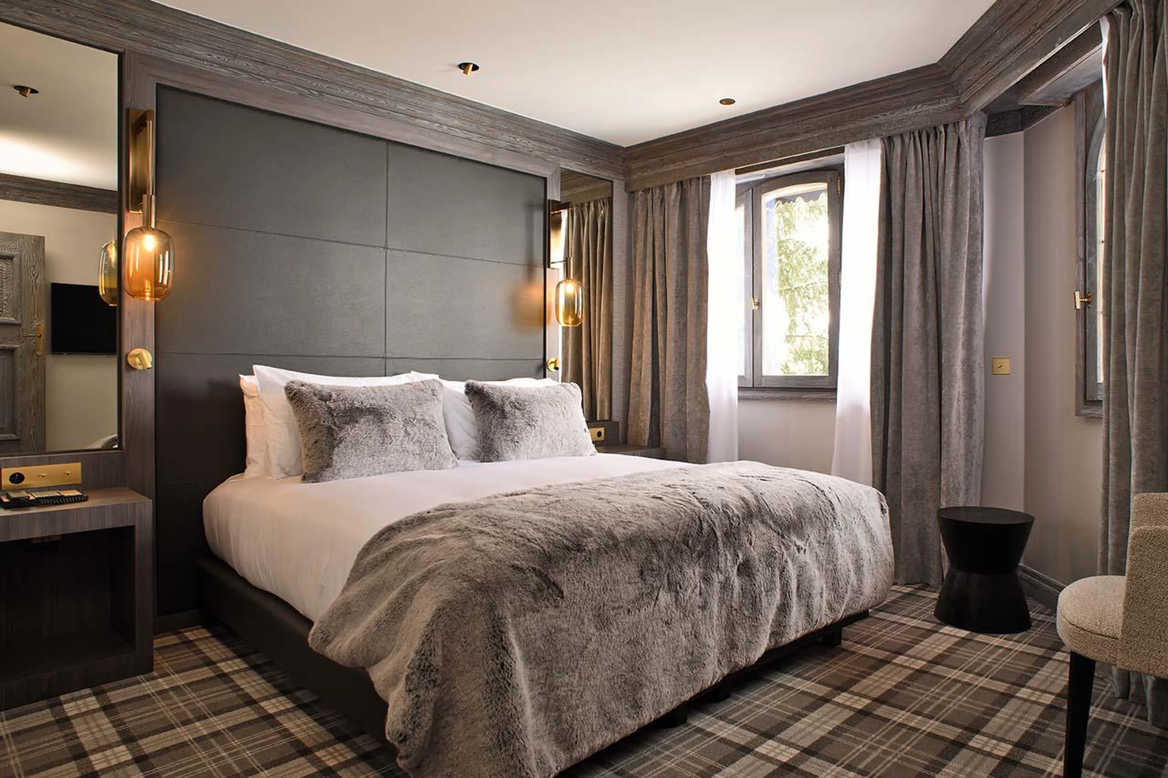 Double bedroom with en-suite shower room at Apartment Bel Air in Courchevel 1850