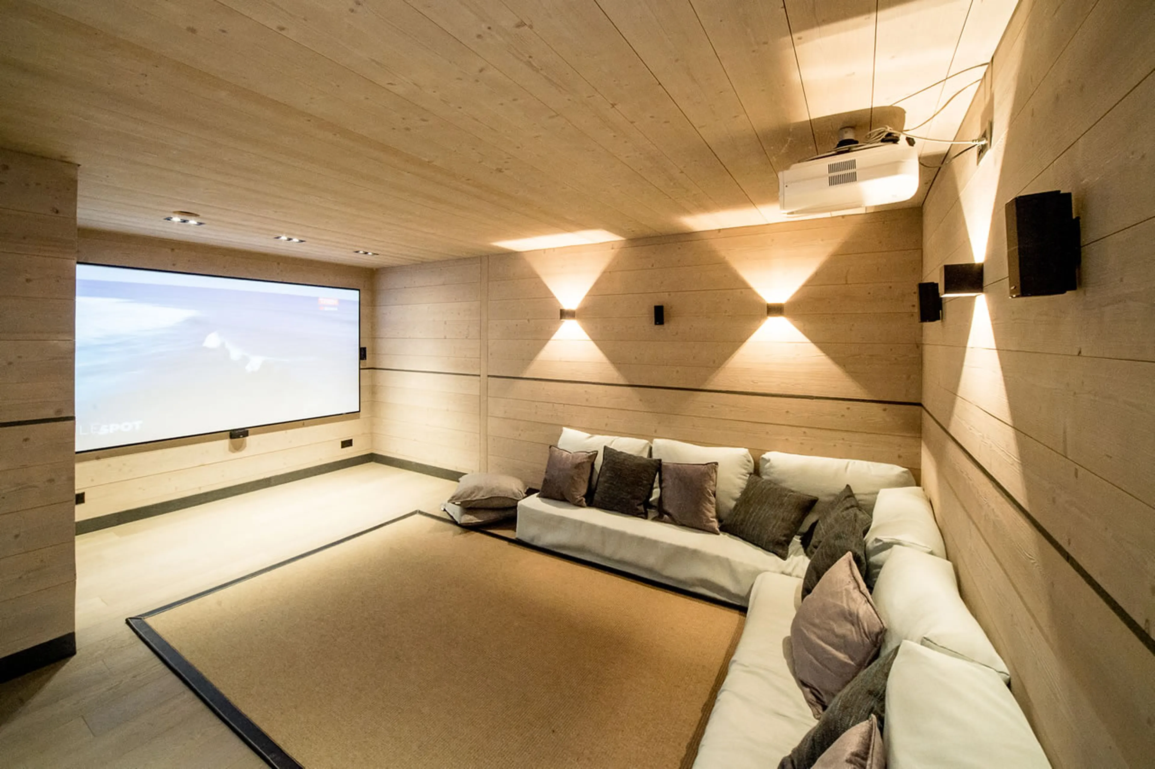 Movies are great fun in this shared cinema room of Apartment Bellalui in Crans-Montana