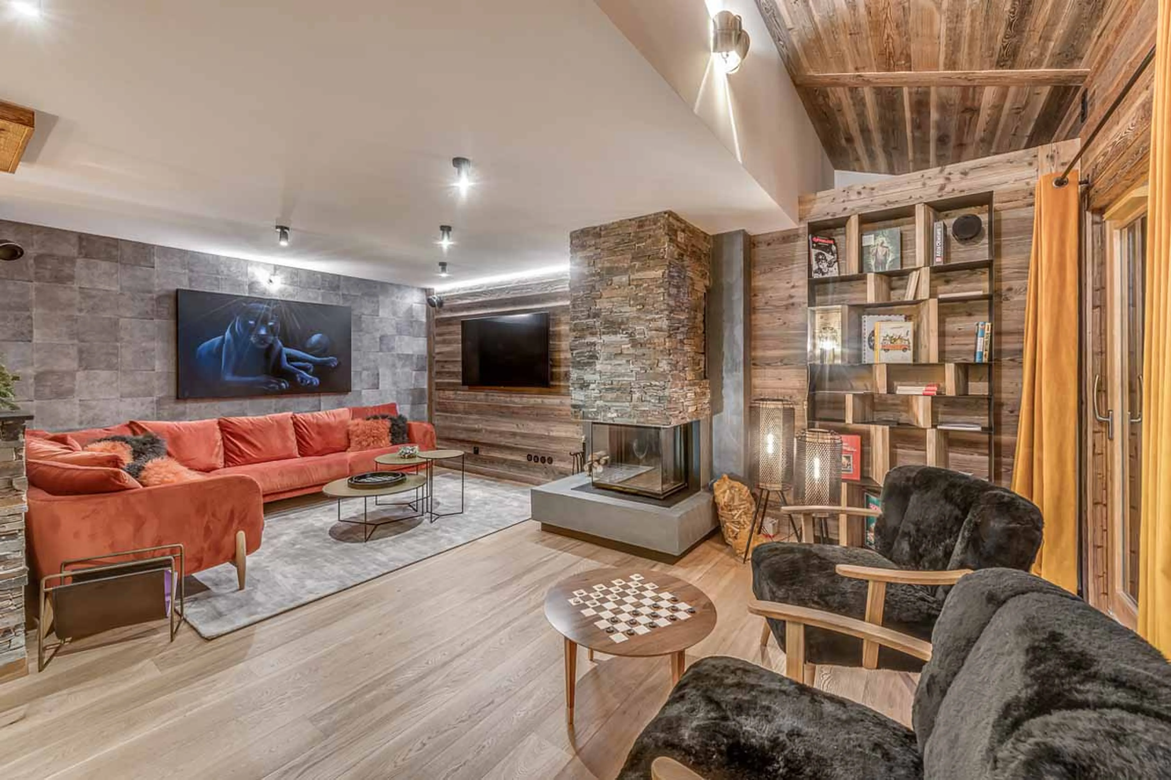 Fireplace in living area of Apartment Ben Nevis in Les Gets