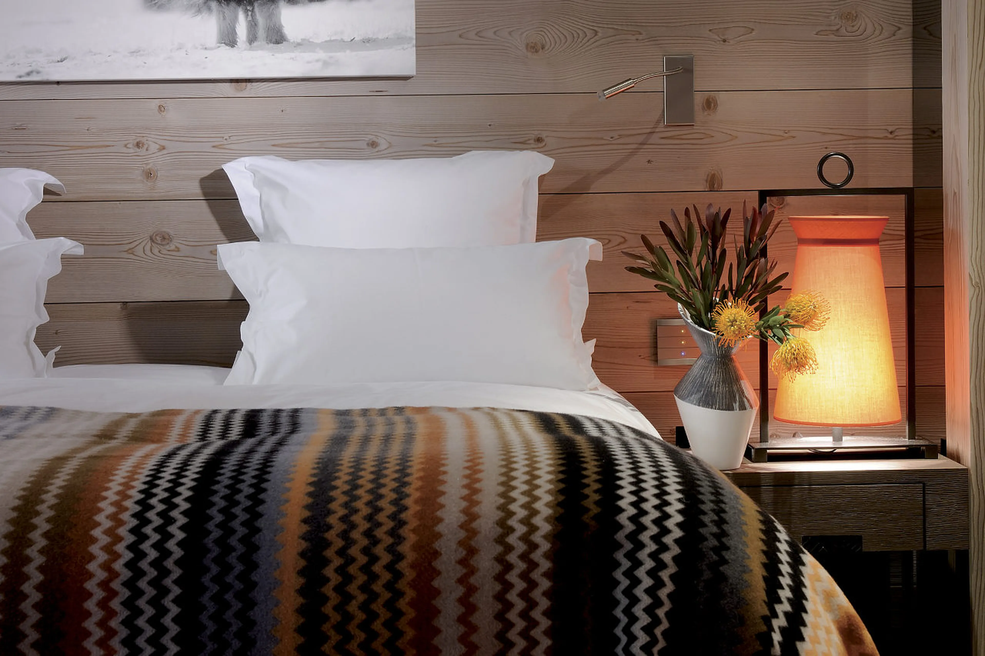 En-suite bedroom with convenient lighting in Apartment Beryl in Courchevel 1850