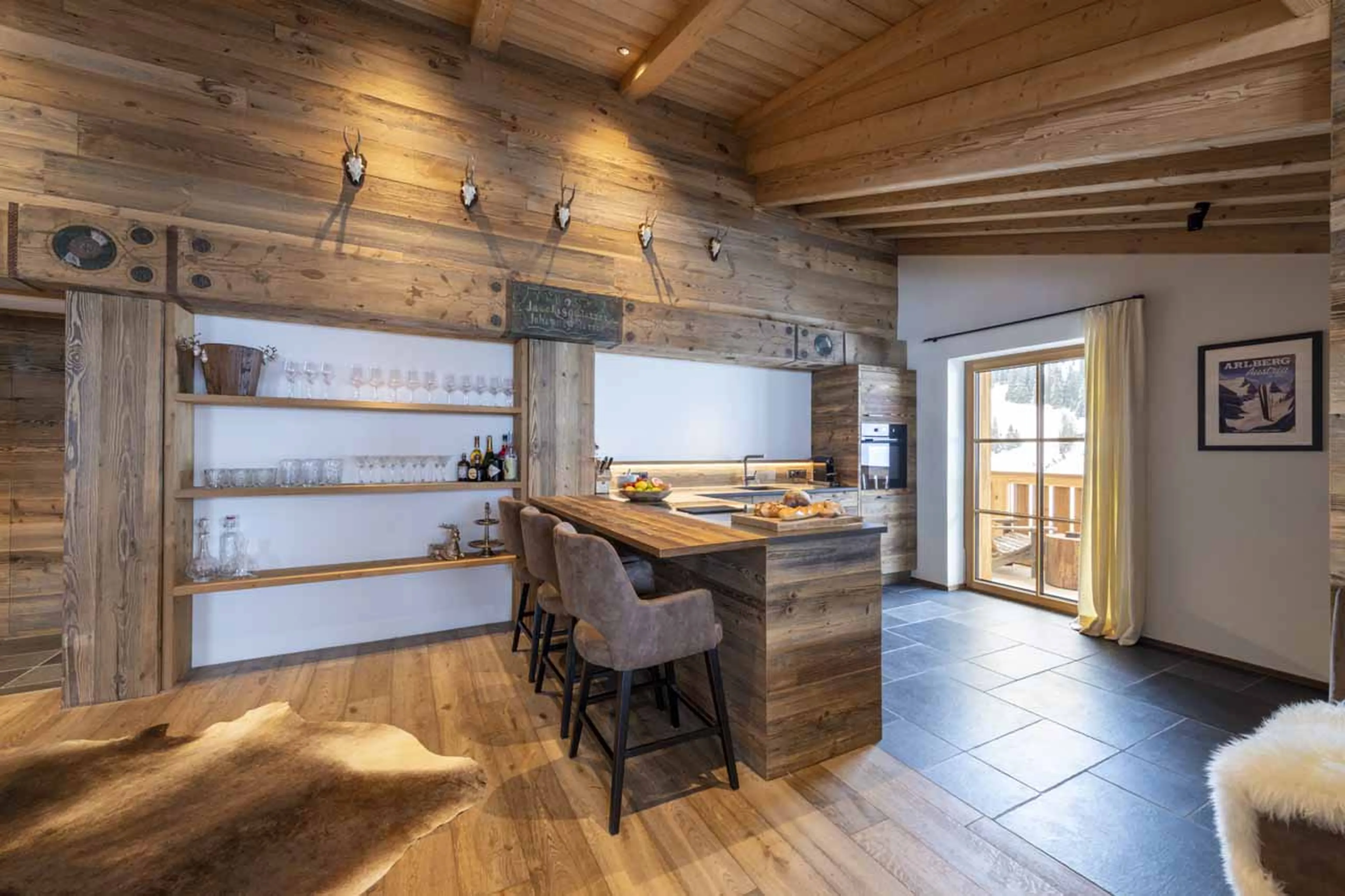 Kitchen with breakfast bar at Apartment Brunnenhof 11 in Lech