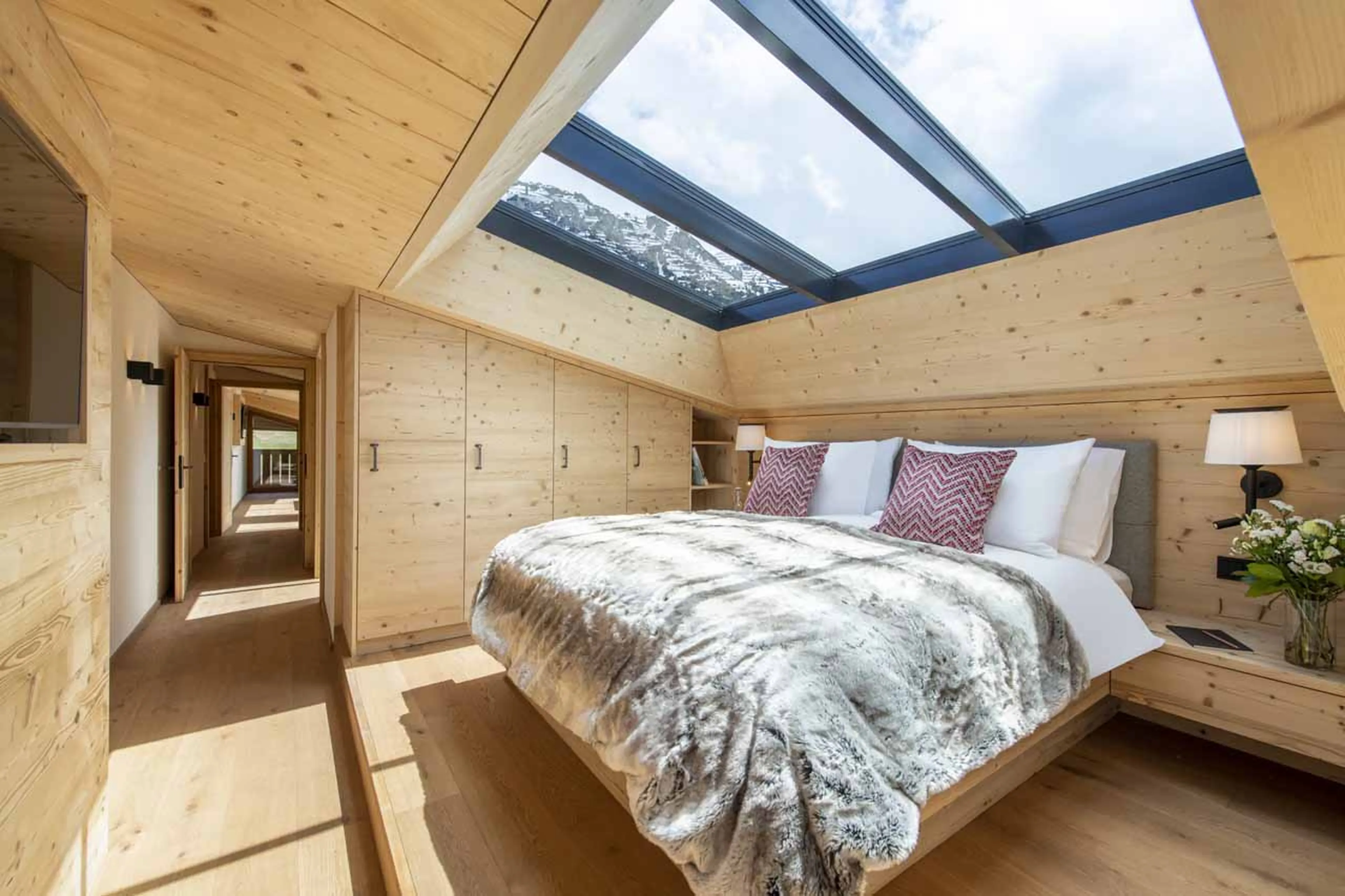 Bedroom one at Brunnenhof Penthouse in Lech