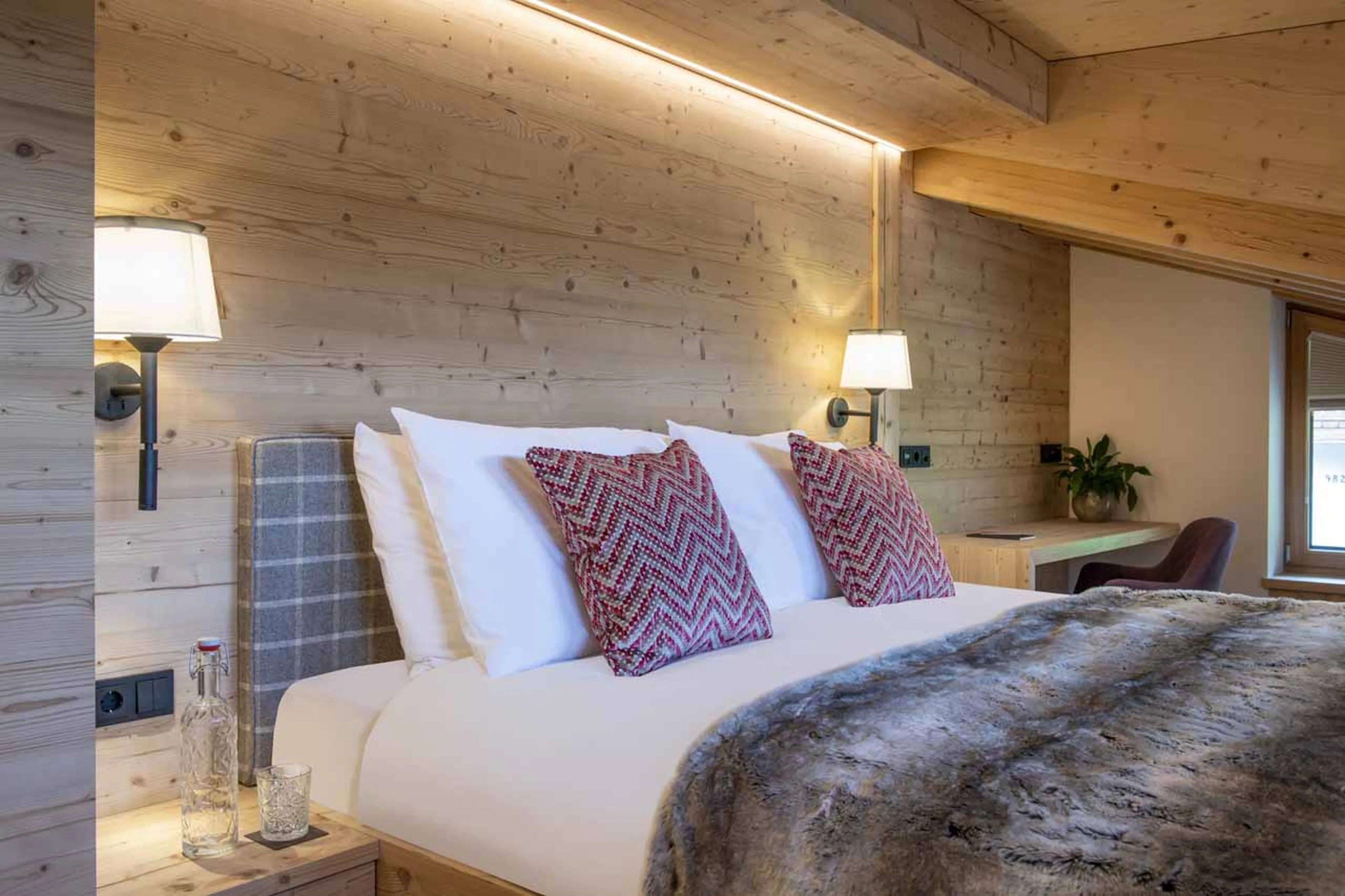 Master double bed at Brunnenhof Penthouse in Lech
