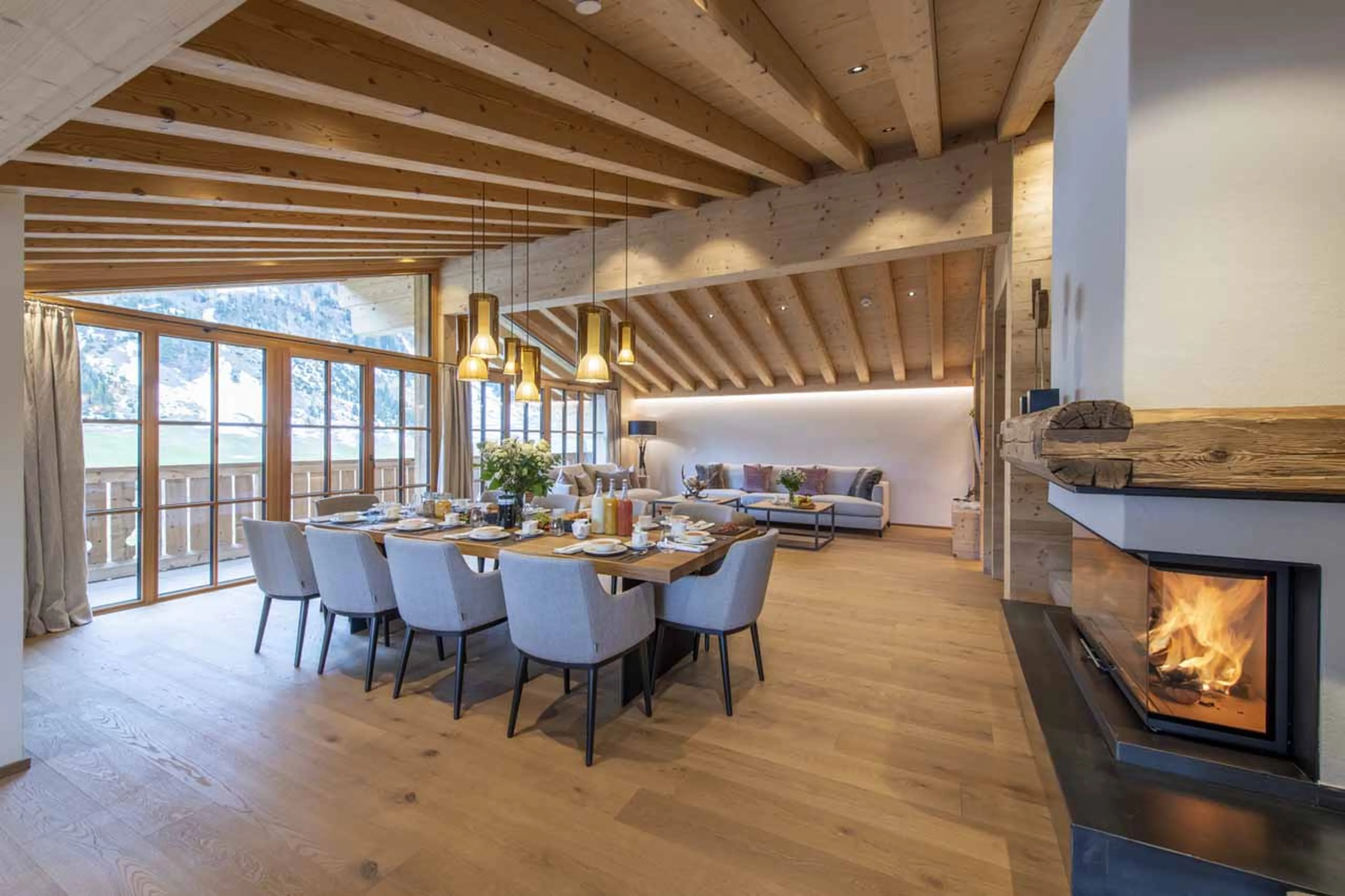 Dining area and fireplace at Brunnenhof Penthouse in Lech