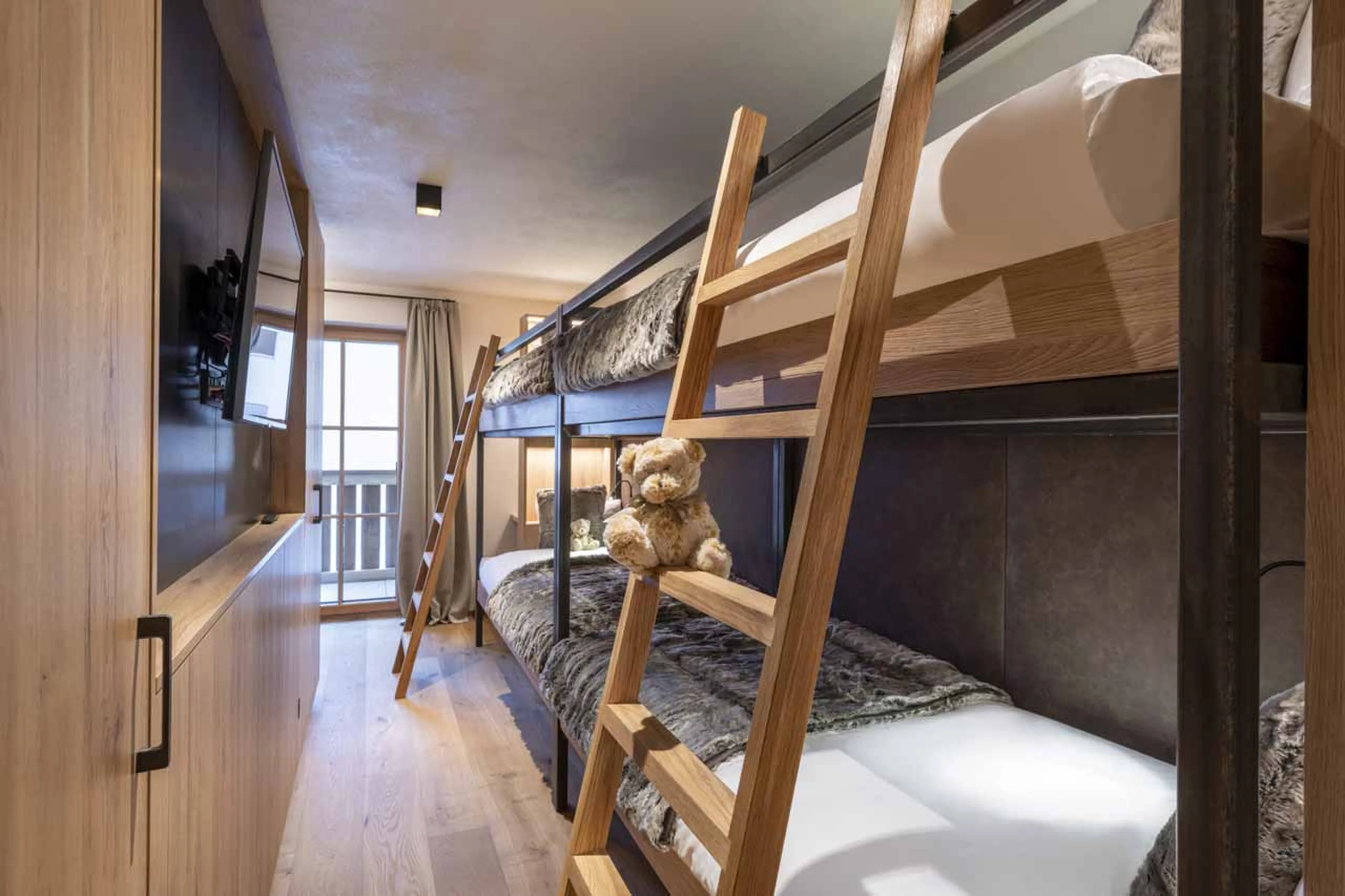 Bedroom three at Apartment Brunnenhof in Lech