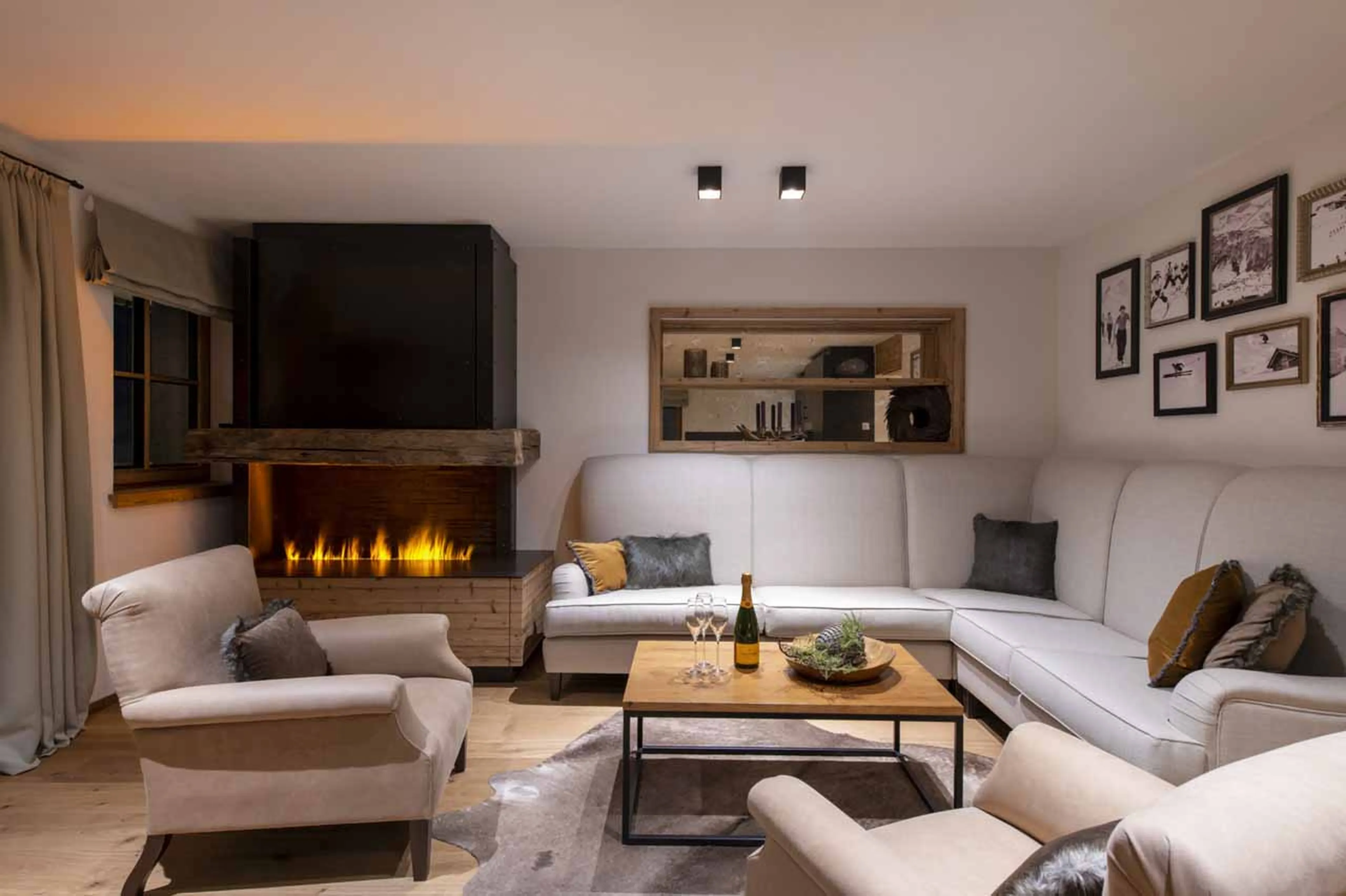 Fireplace in living area of Apartment Brunnenhof in Lech