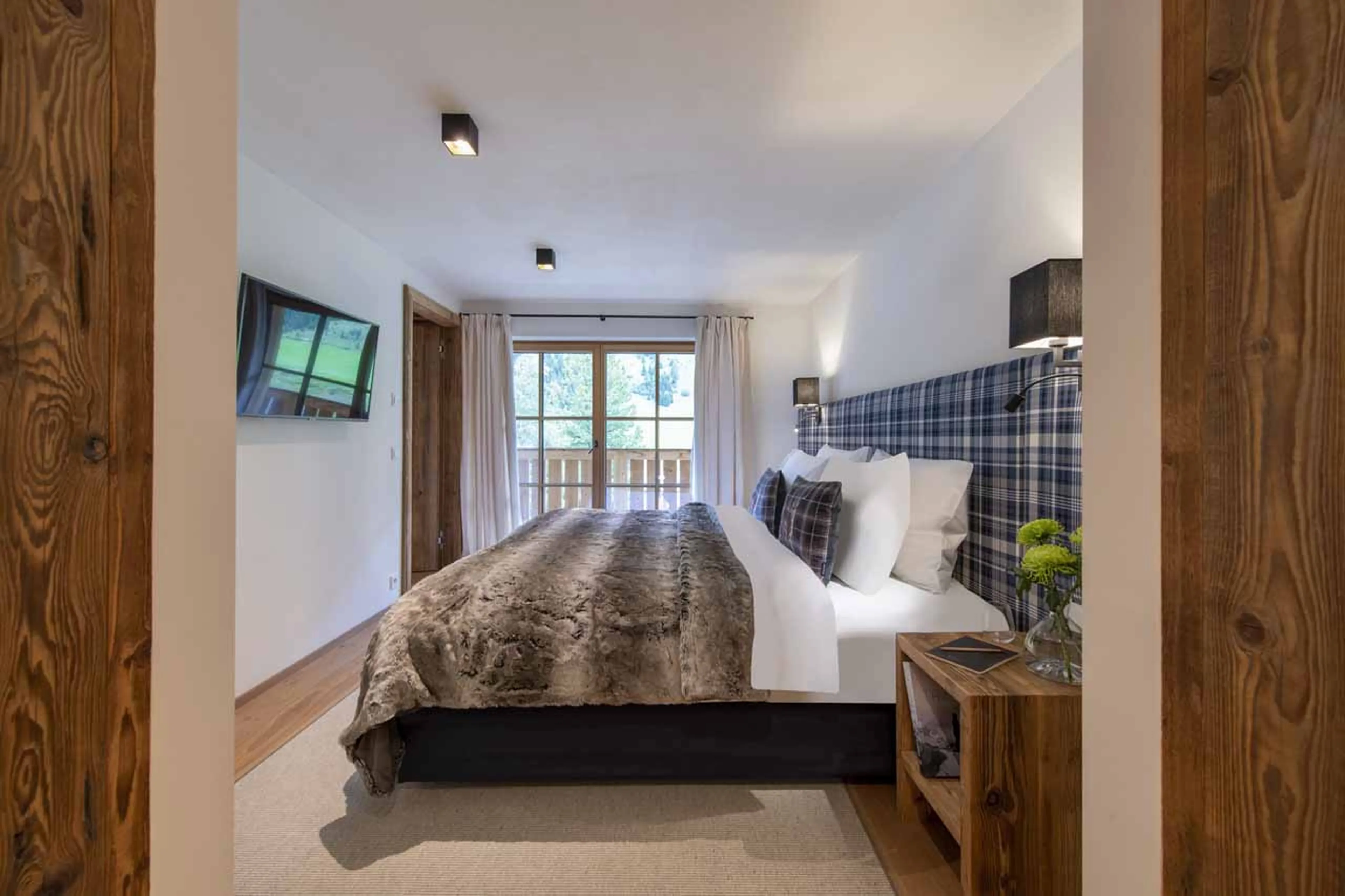 Terrace access from master suite at Apartment Brunnenhof 6 in Lech