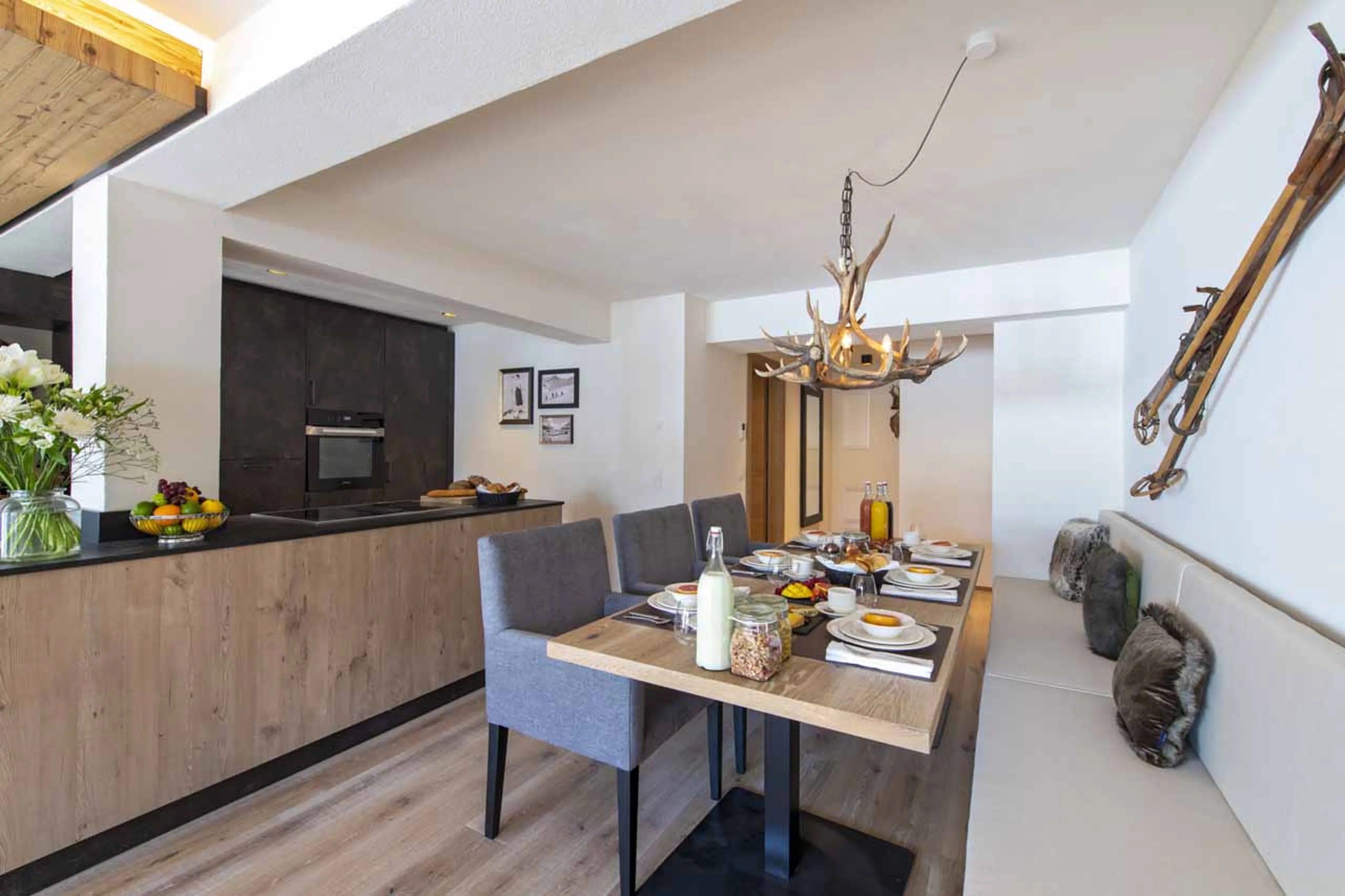 Open plan dining and kitchen area at  Apartment Brunnenhof 7 in Lech