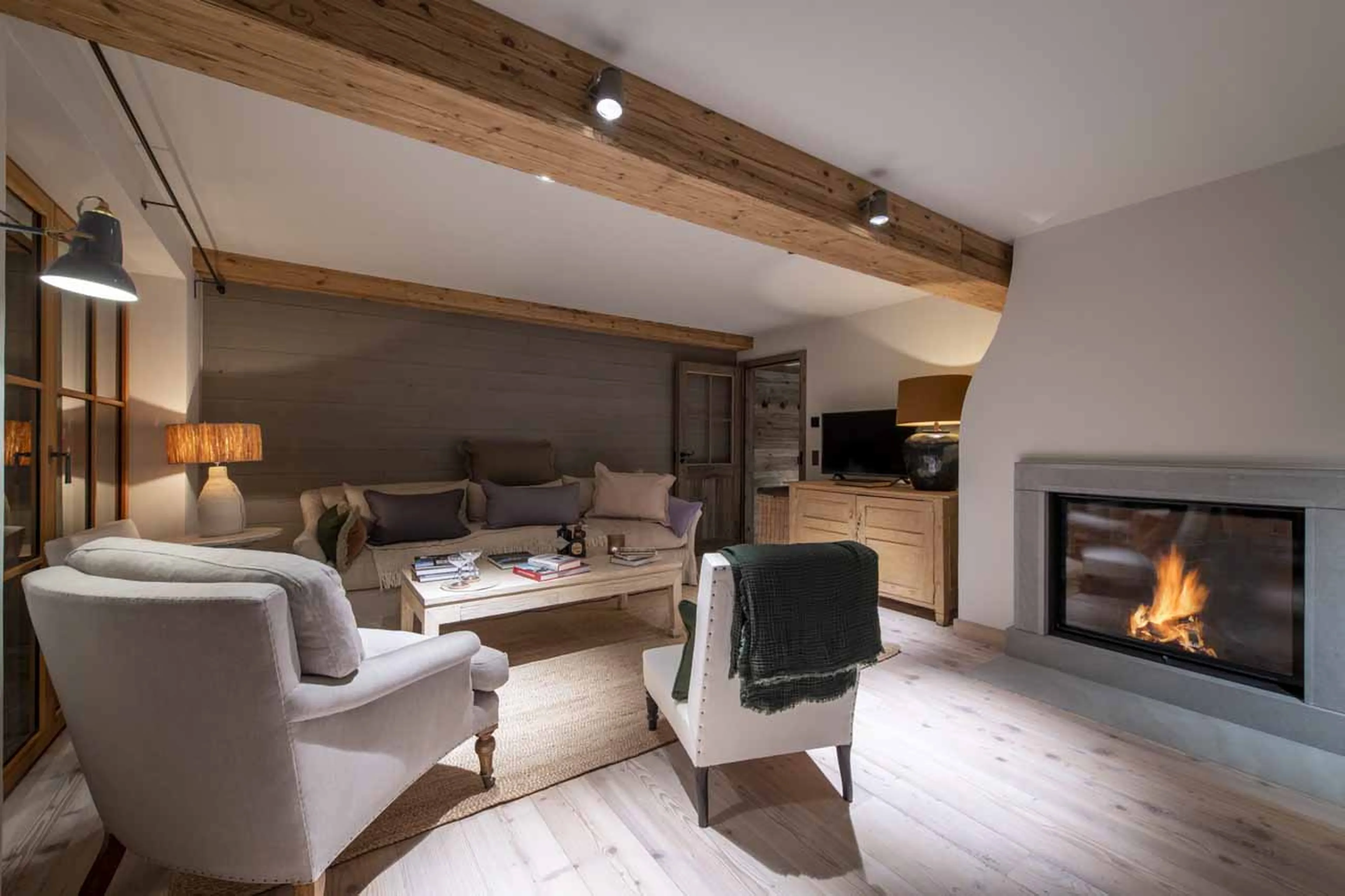 Fireplace in living area at Apartment Brunnenhof 8 in Lech