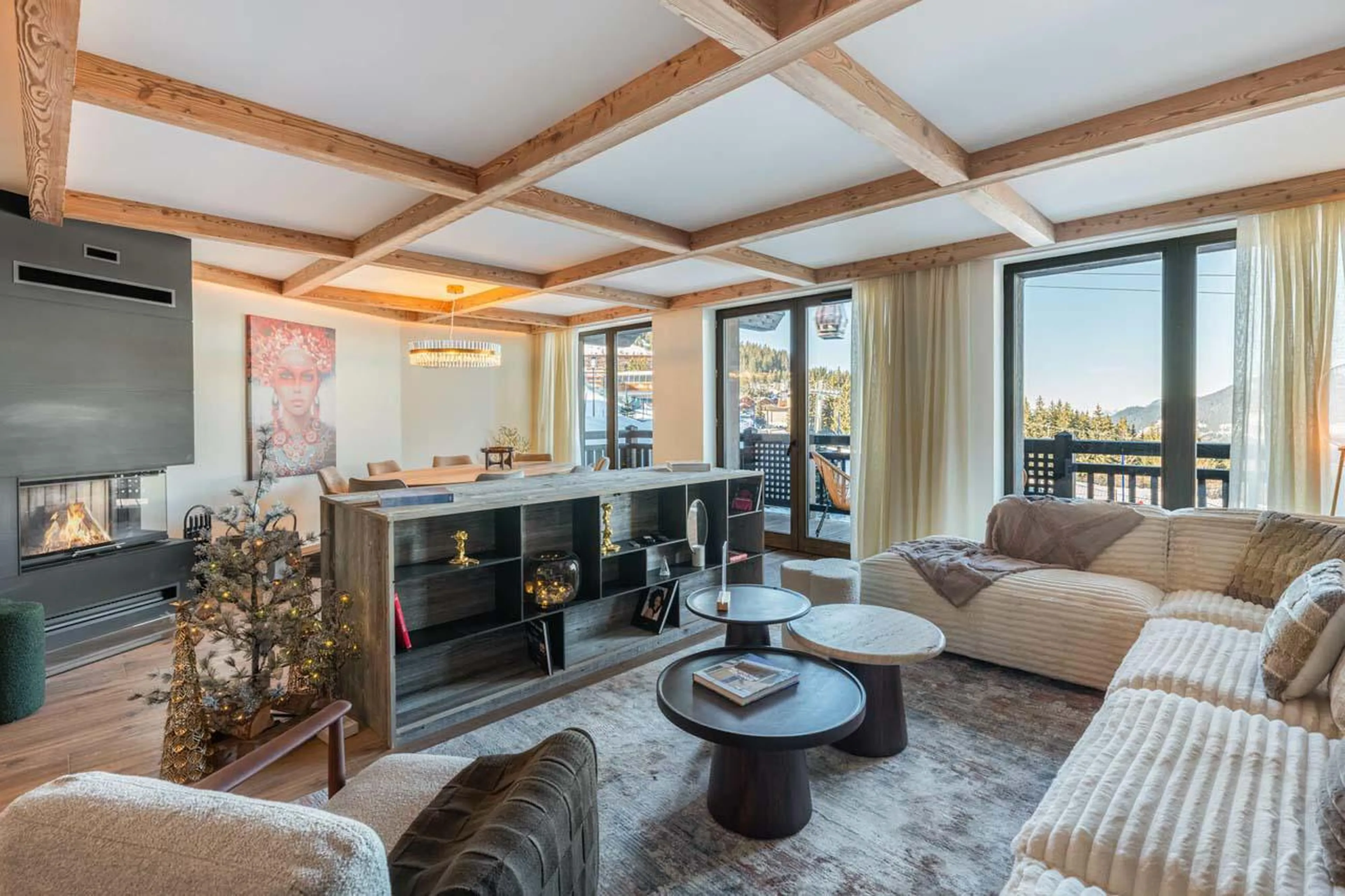 Living area with balcony access in Apartment Castano in Courchevel 1850