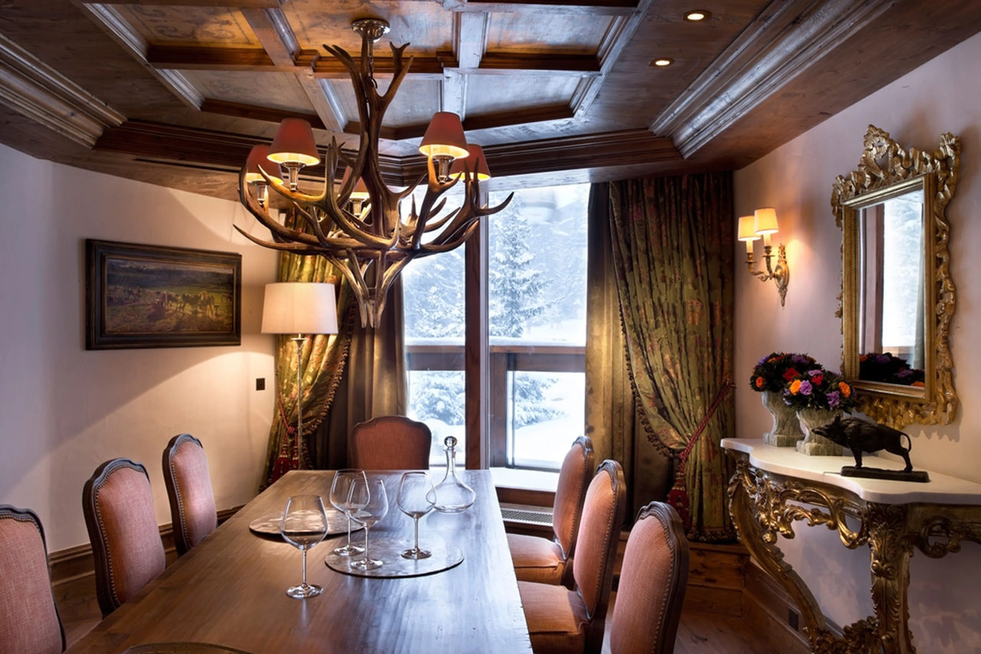 Elegant dining room with balcony access in Apartment Jardin Alpin, Courchevel 1850