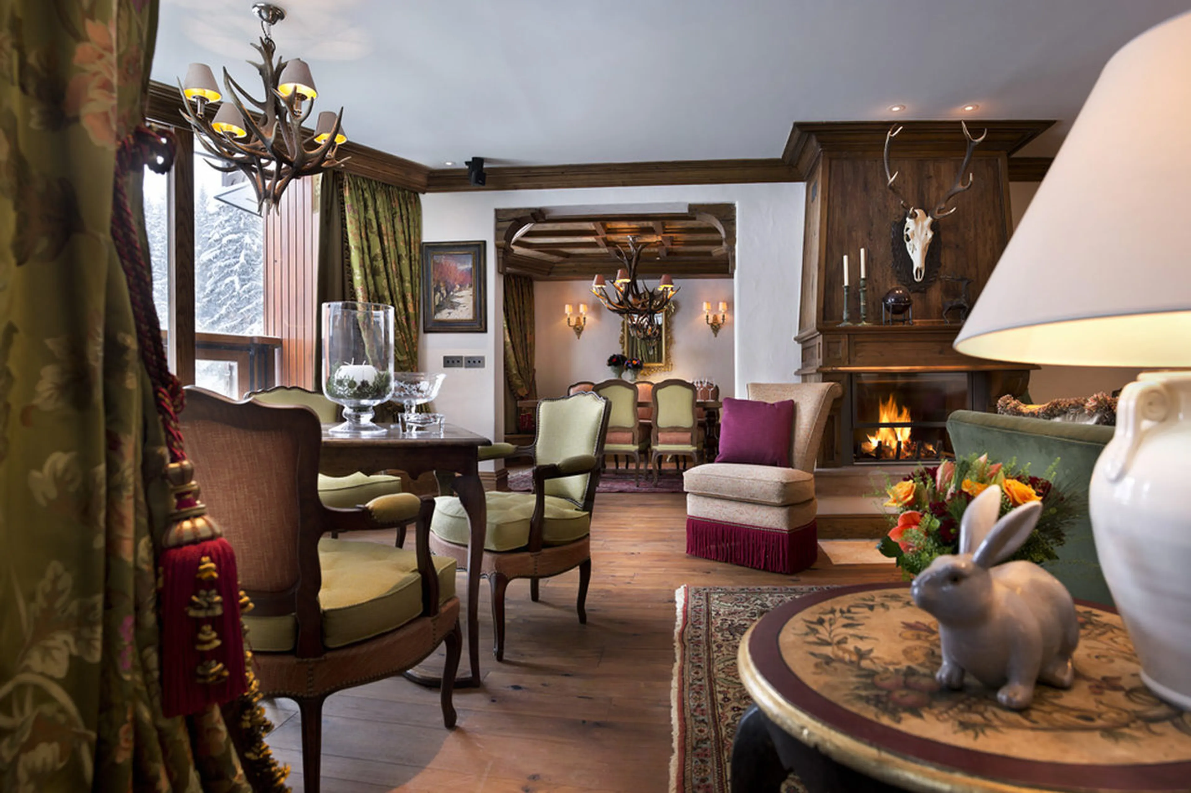 Living room with games table and balcony access in Apartment Jardin Alpin, Courchevel 1850