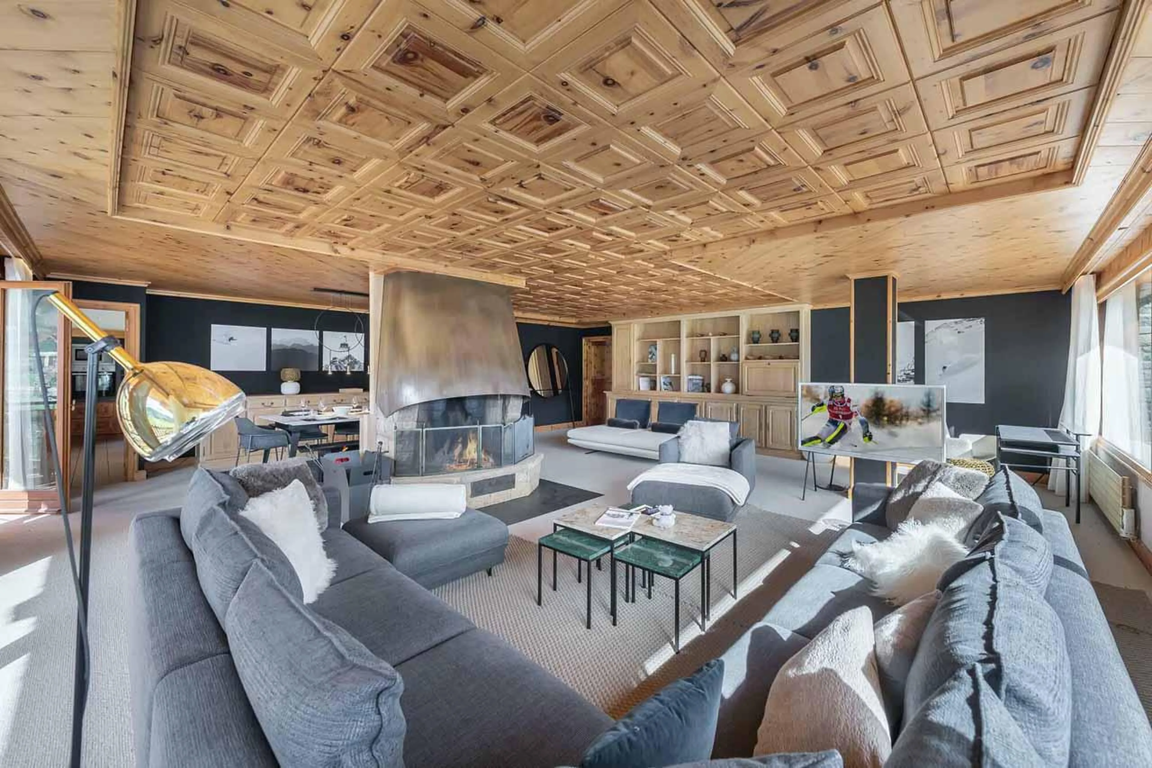 Lounge with fireplace at Apartment Jean Blanc 3 in Courchevel 1850