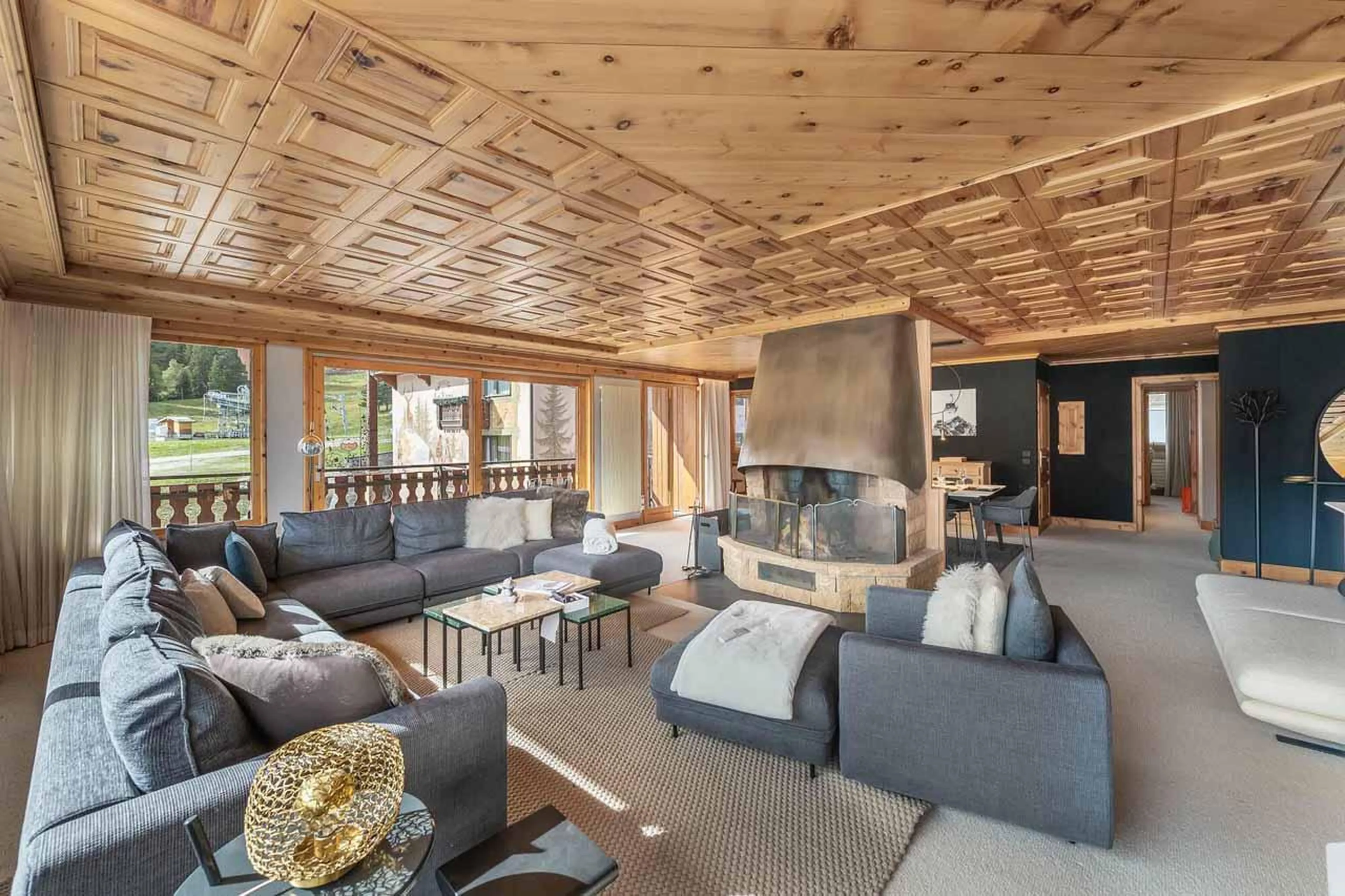Sofas and fireplace at Apartment Jean Blanc 3 in Courchevel 1850