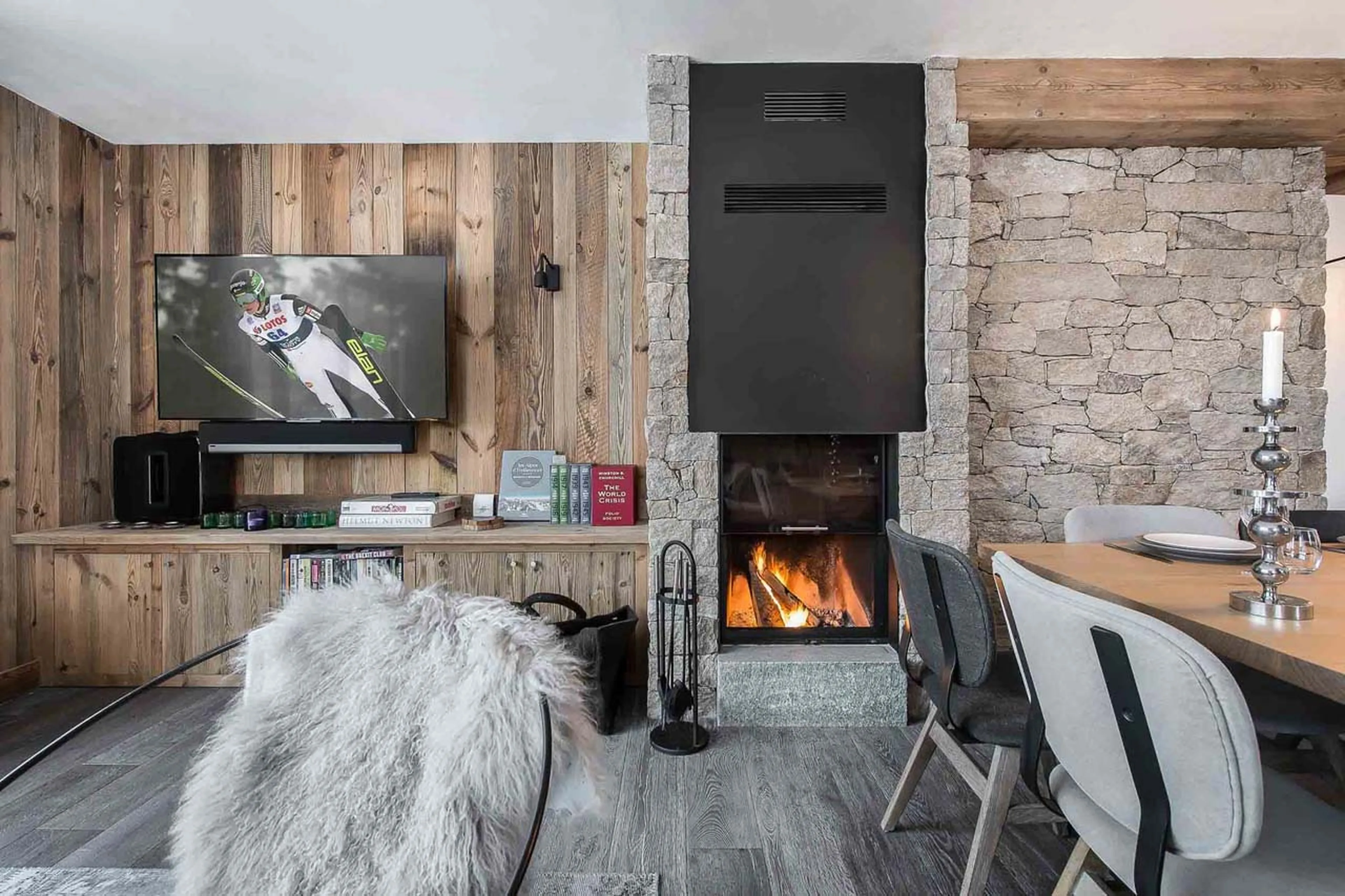 Fireplace in living area of Apartment la Canadienne 8 in Val d'Isere