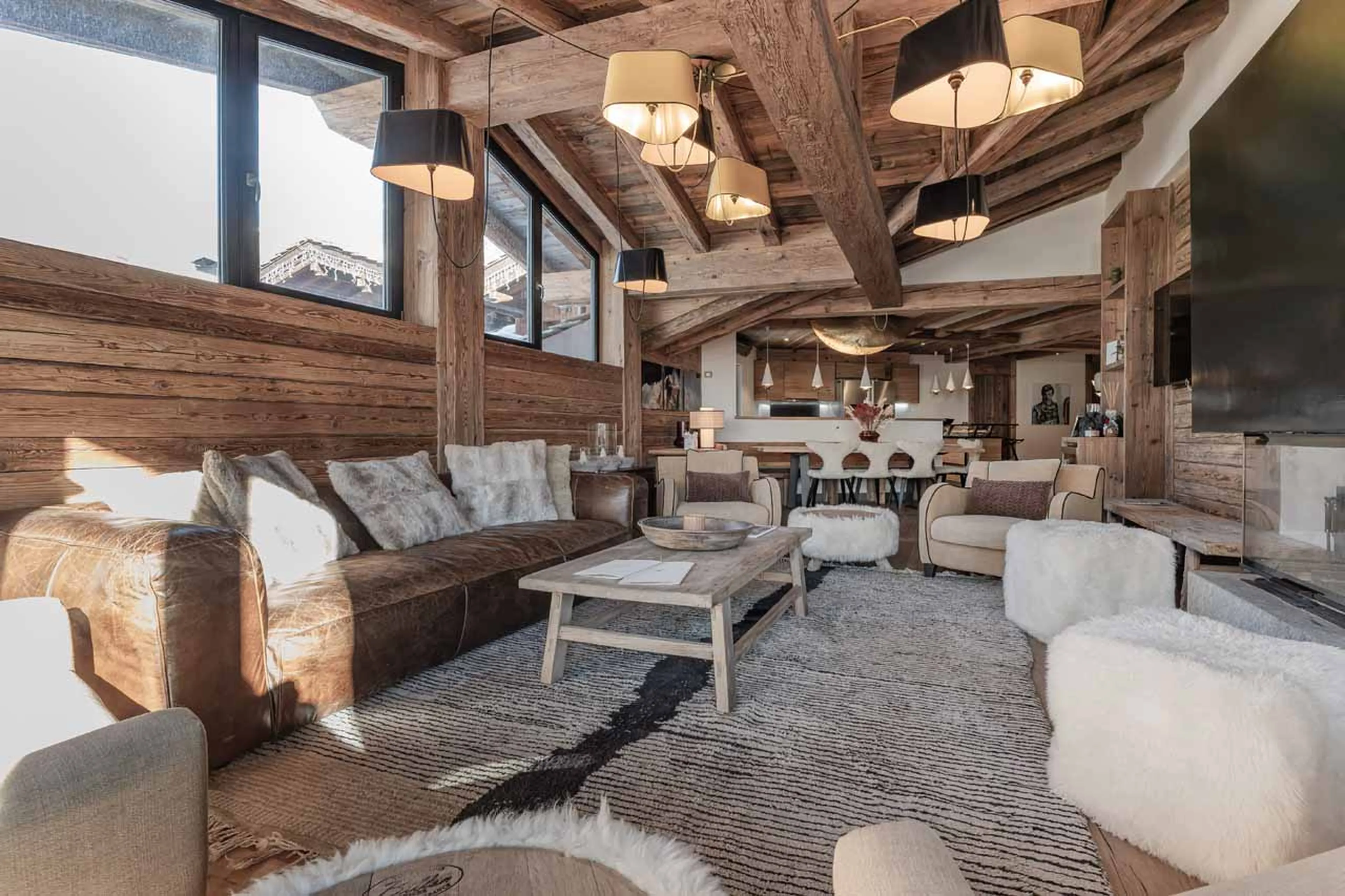 Open-plan living, kitchen and dining area in Le Penthouse Savoie, Val d'Isere