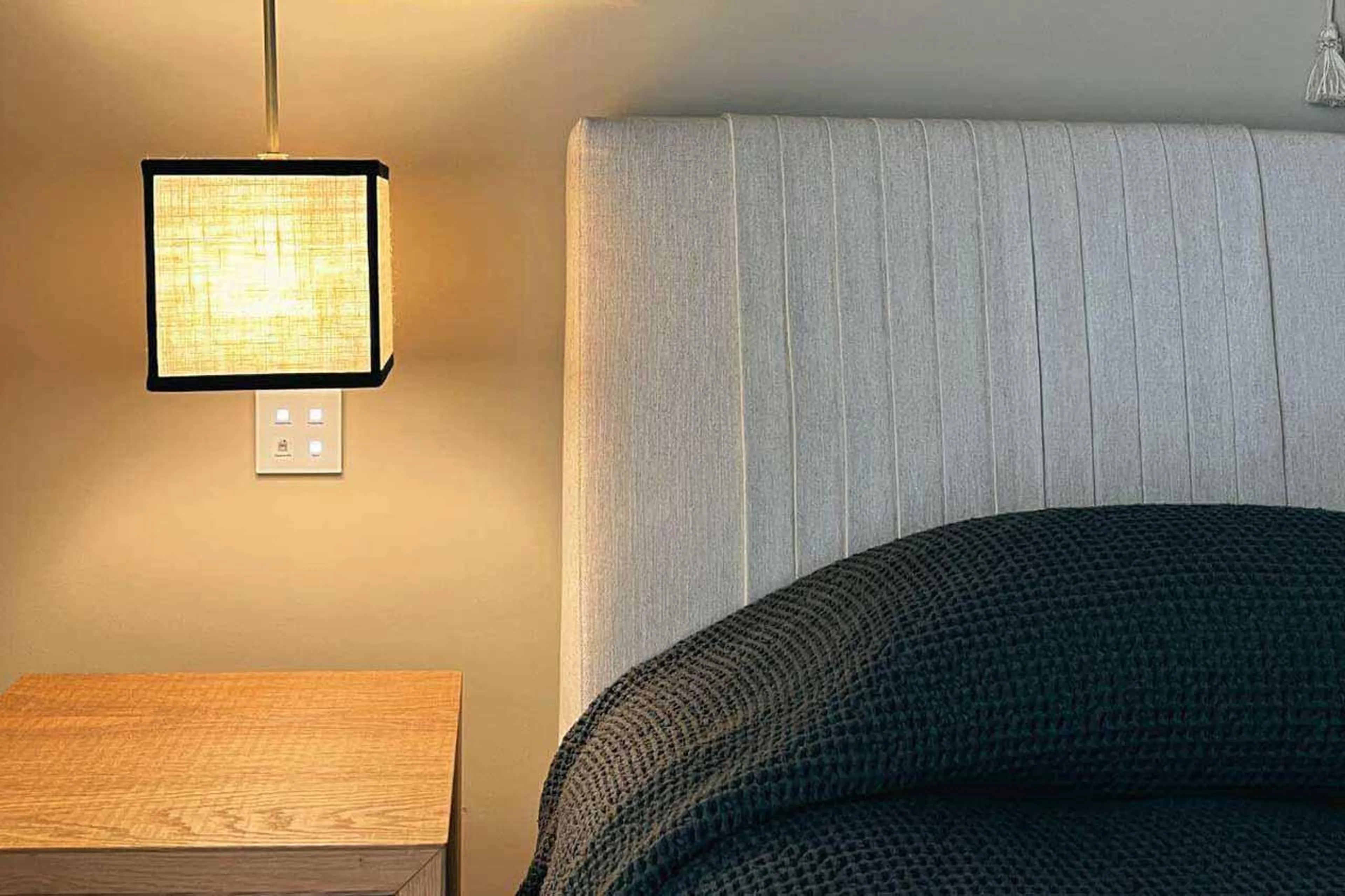 Bedside table and light in Apartment Lain Alpin, St Moritz