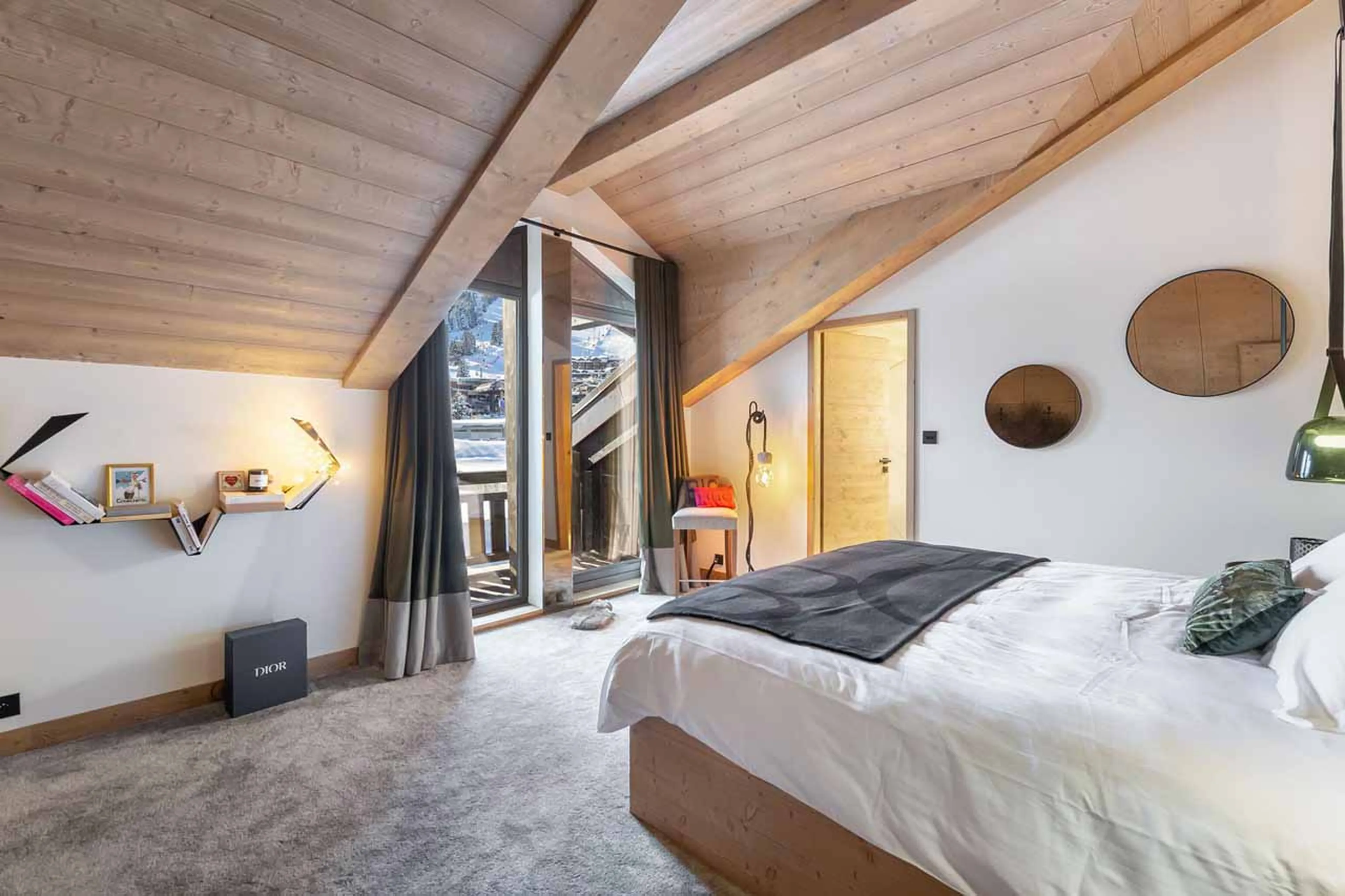 Double bed at Apartment Le Septieme Ciel in Courchevel 1850