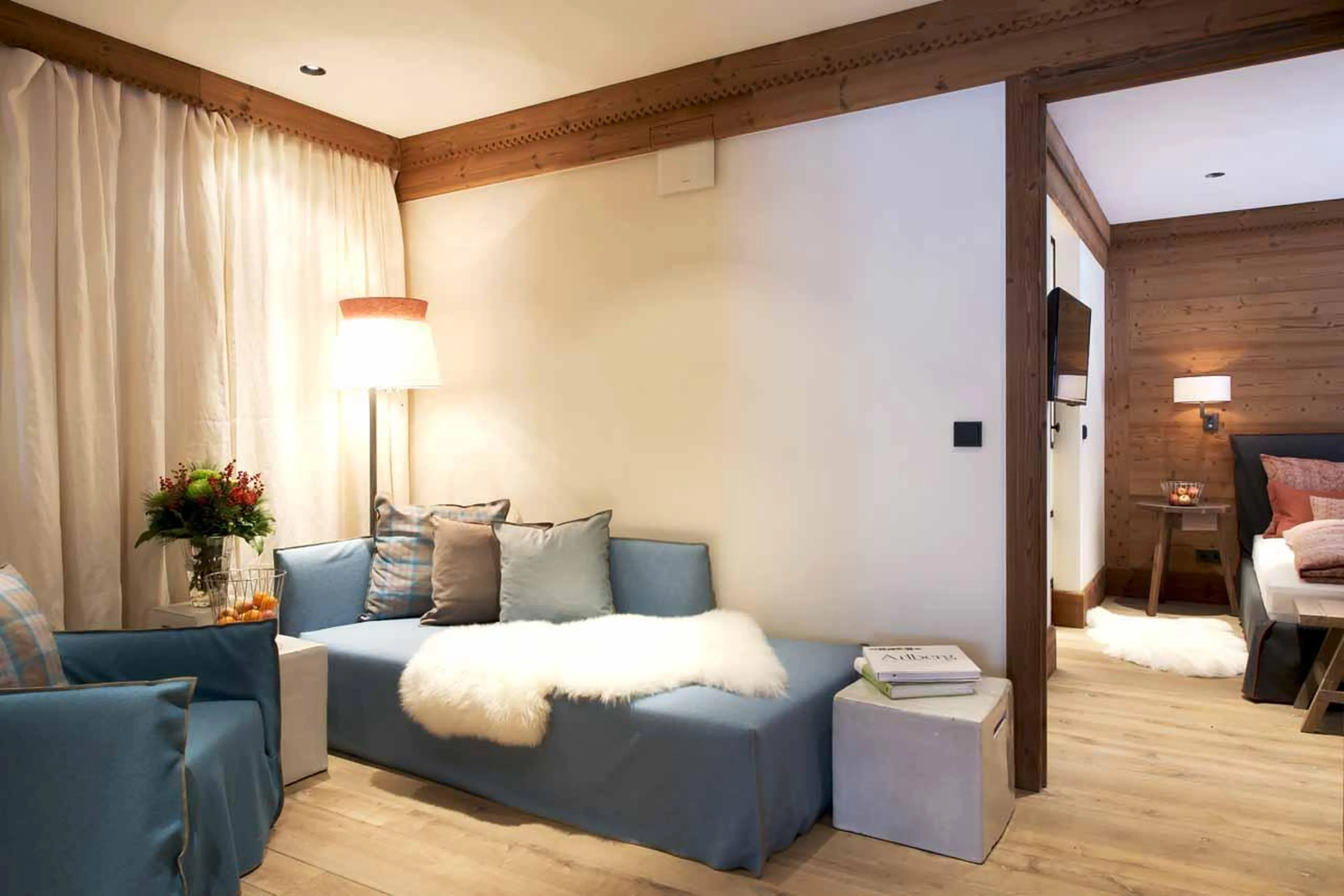 Sofa bed and armchair on landing in Apartment Lech I, Lech