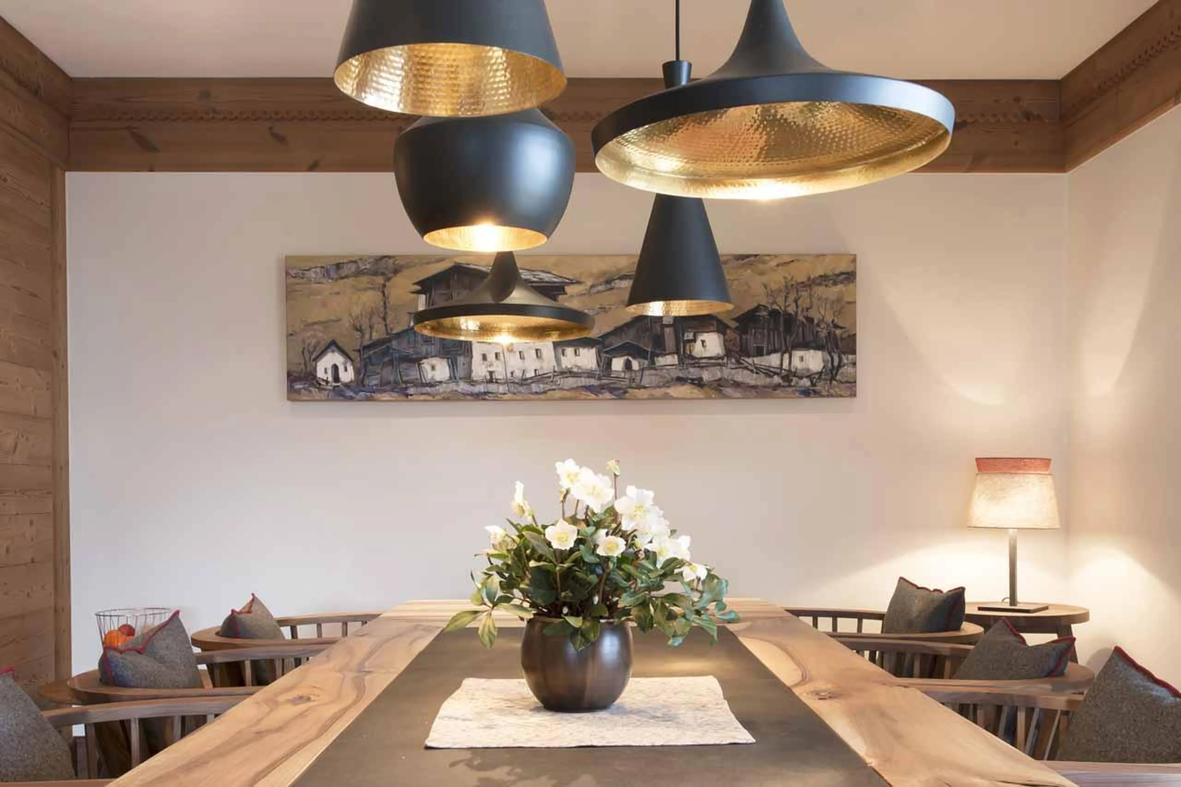 Stylish lighting above dining table in Apartment Lech II, Lech