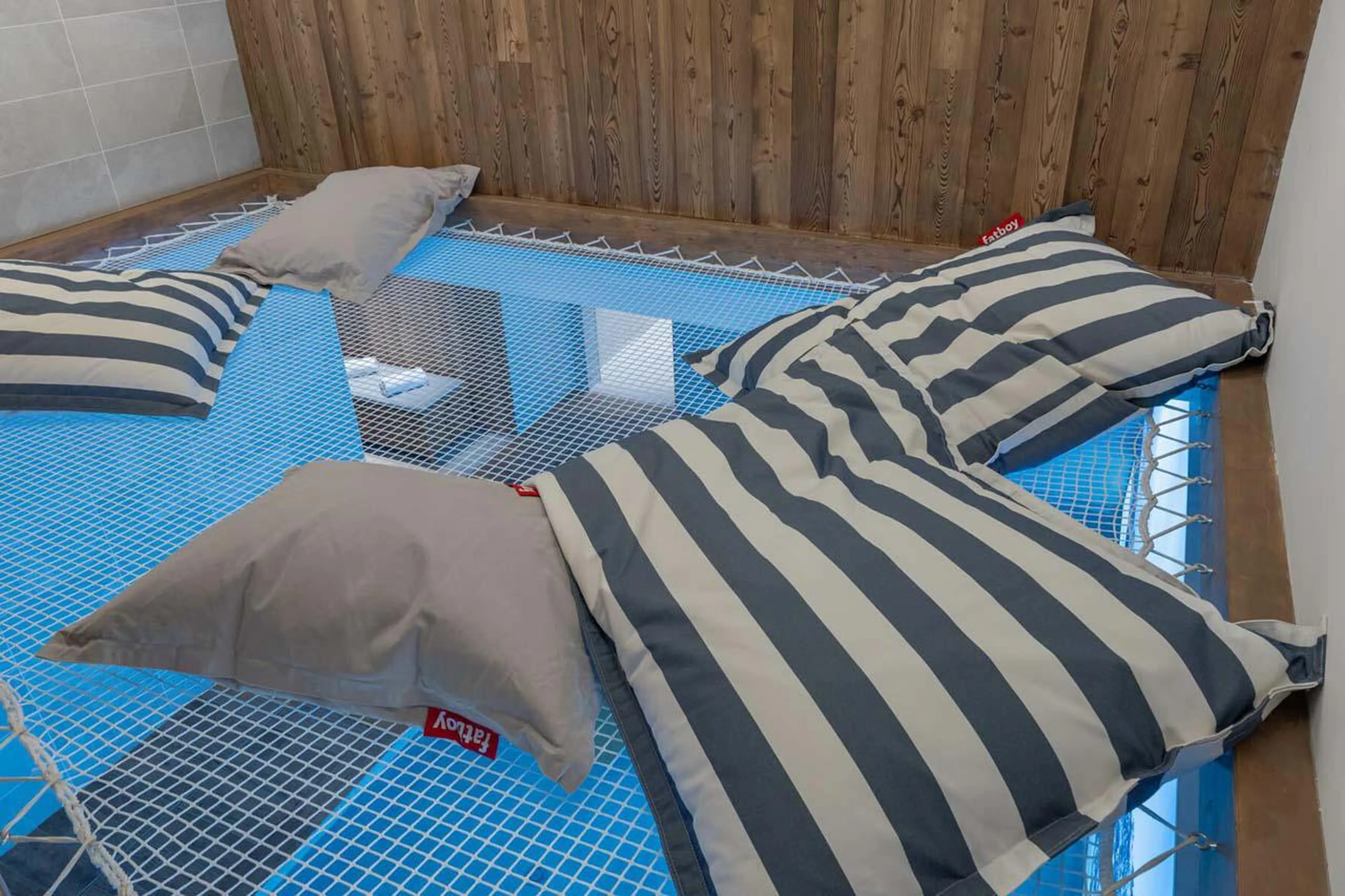 Relaxation space above swimming pool at Apartment Limeo in Courchevel 1850