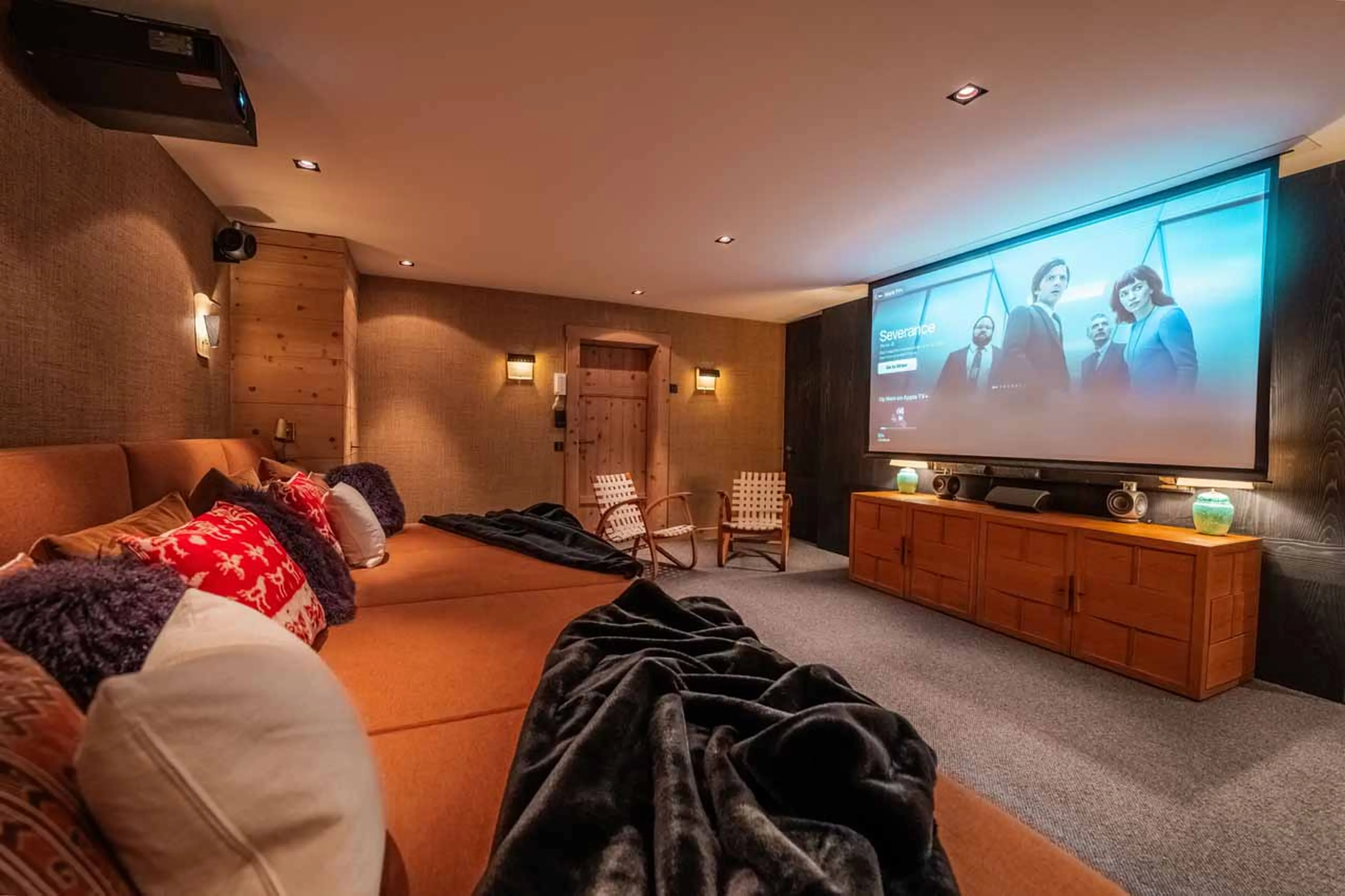 Cinema room screen at Apartment Luna in Gstaad