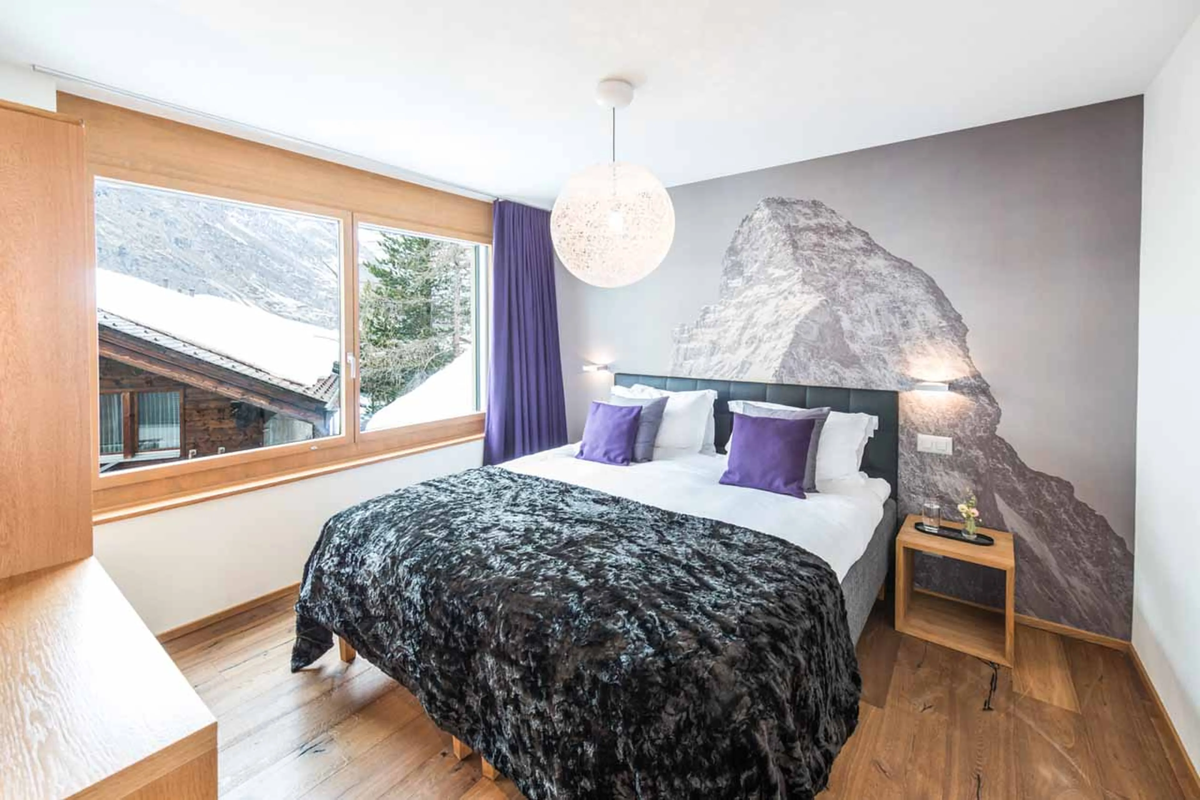 Bedroom one at Apartment Lys in Zermatt