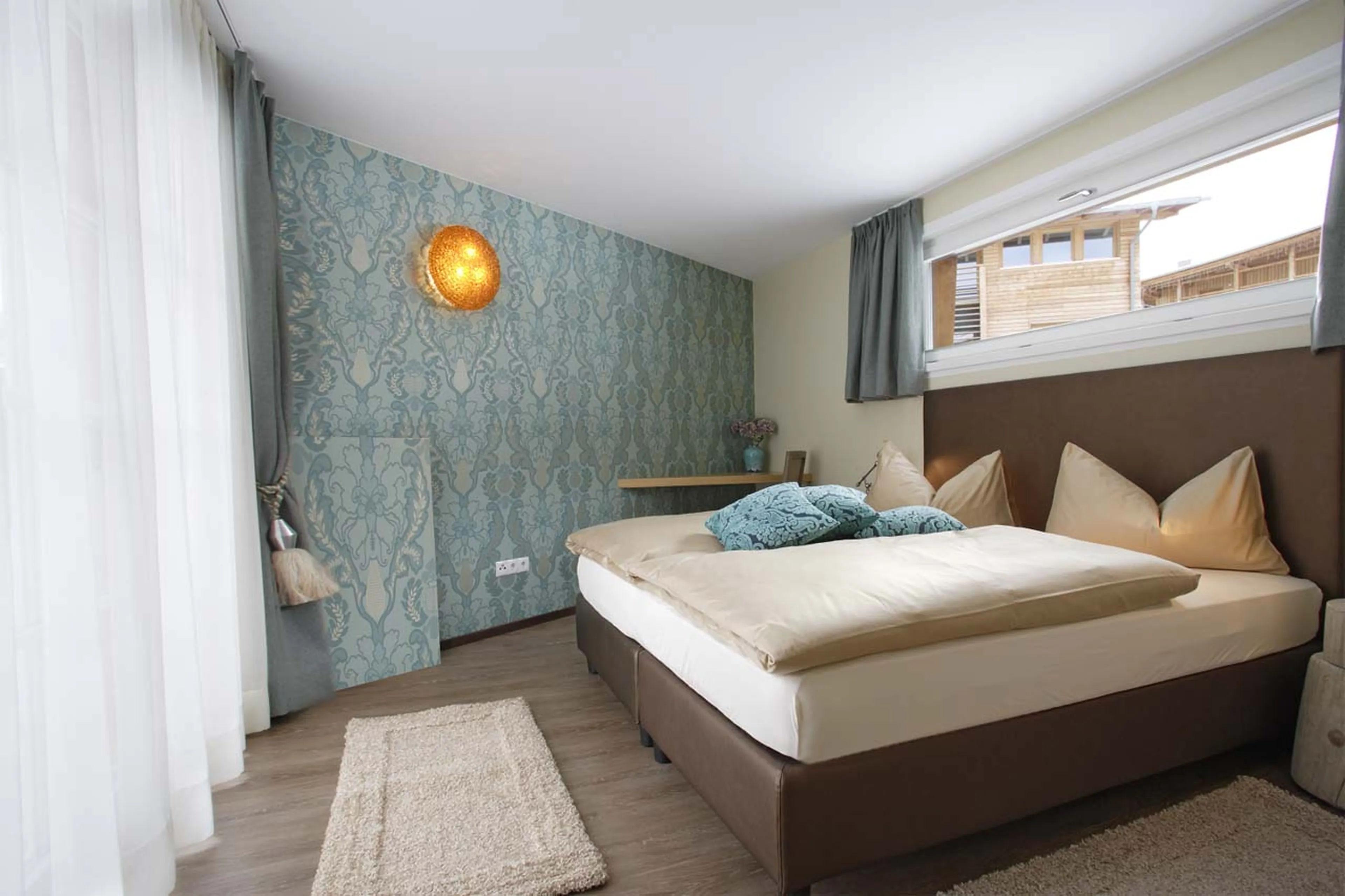 Bedroom one at Chalet Mi Amur in Alta Badia